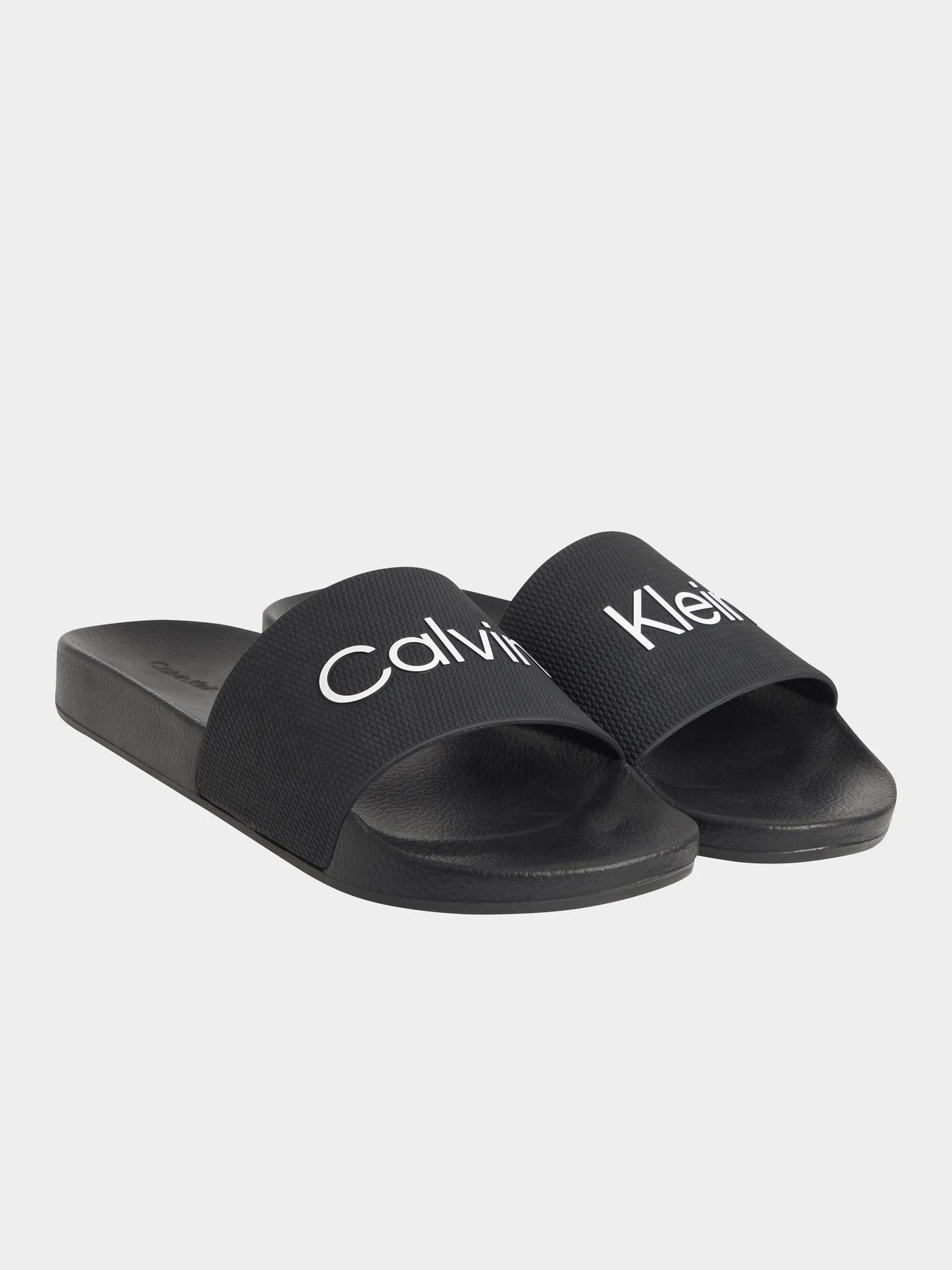 Шлёпанцы Calvin Klein модель HM0HM01000-BEH Шлёпанцы Calvin Klein модель HM0HM01000-BEH Фото