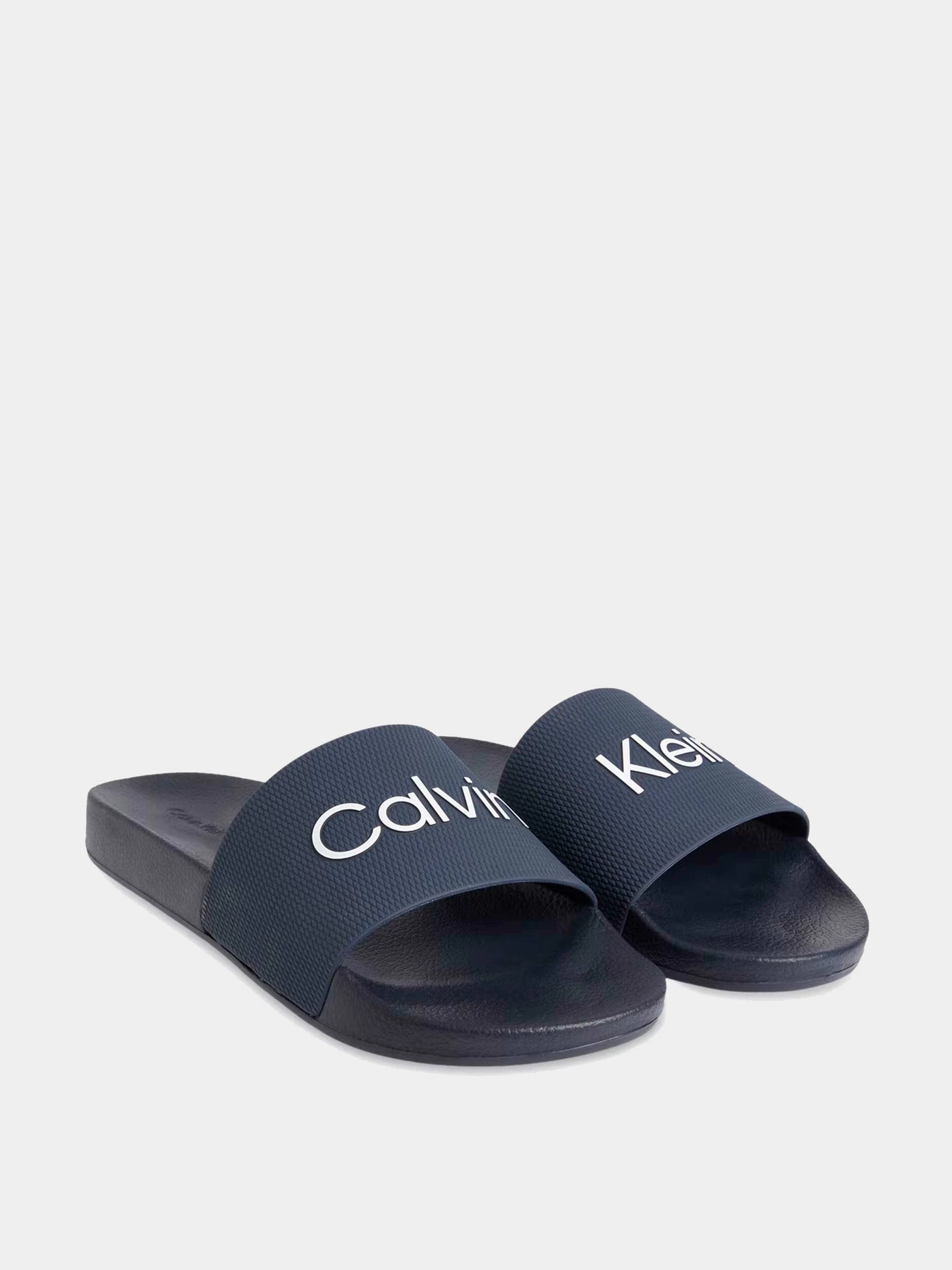 Шлёпанцы Calvin Klein модель HM0HM01000-DW4 Шлёпанцы Calvin Klein модель HM0HM01000-DW4 Фото
