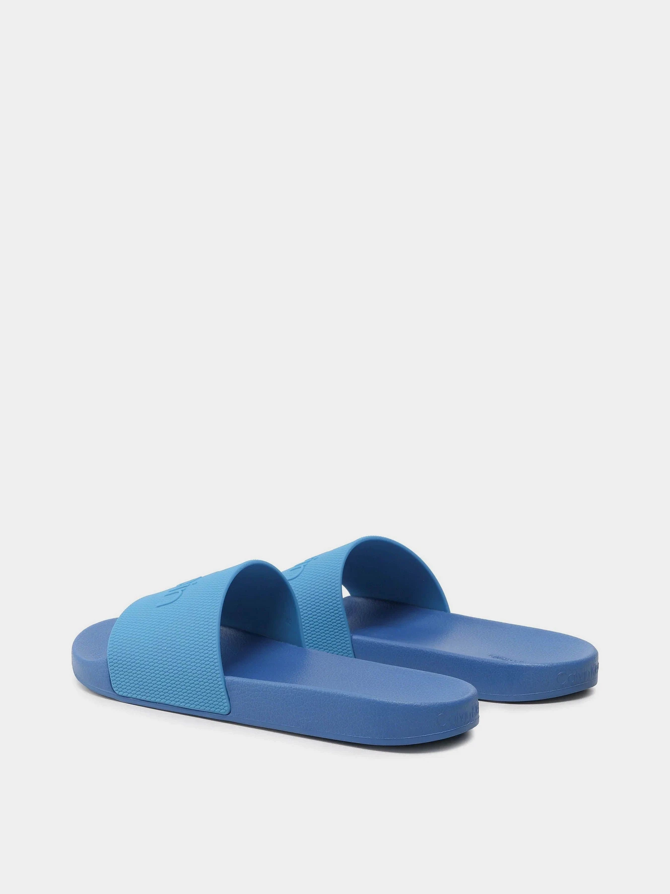 Шлёпанцы Calvin Klein модель HM0HM00636-C66 Шлёпанцы Calvin Klein модель HM0HM00636-C66 Фото