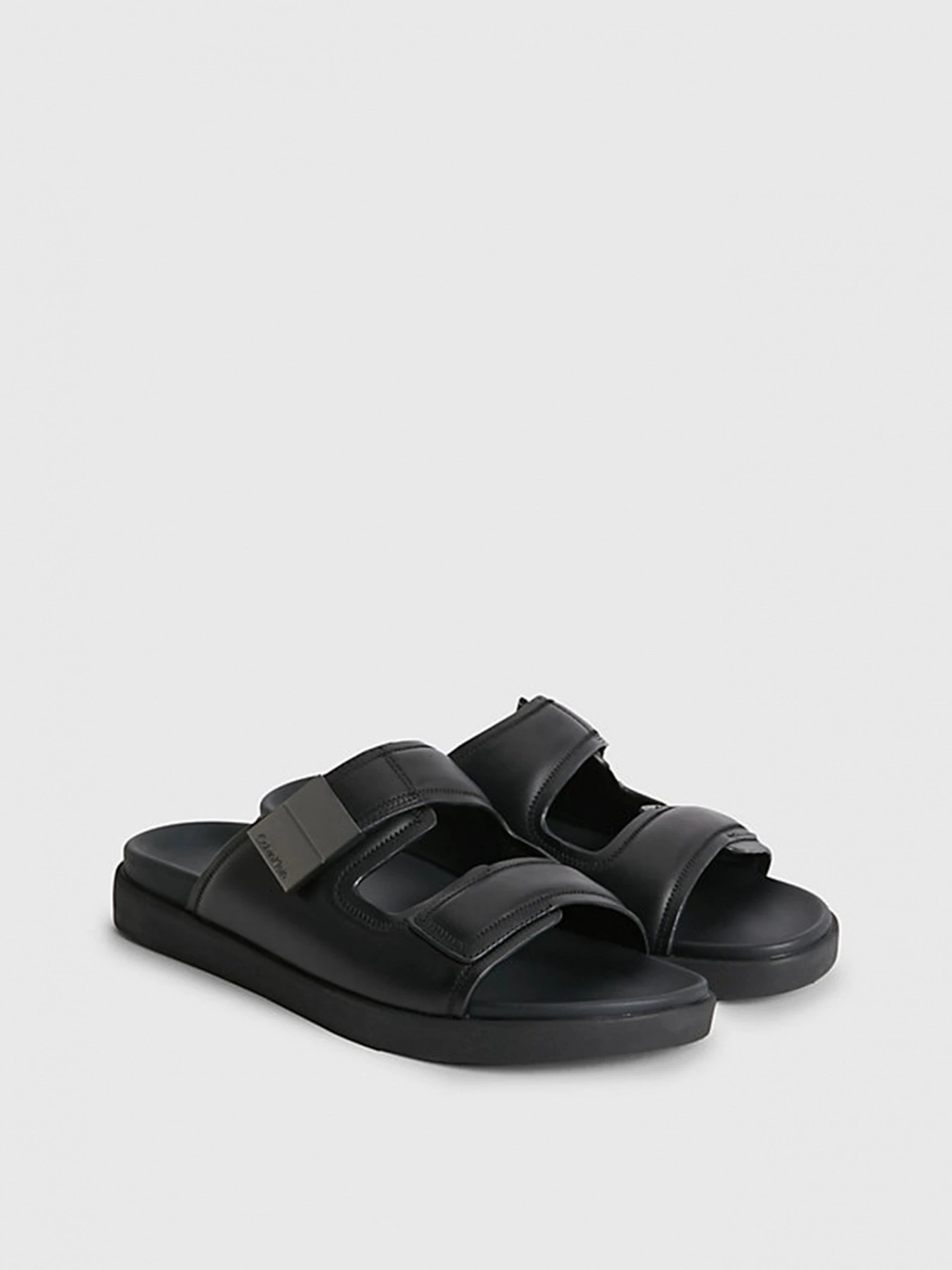 Шлёпанцы Calvin Klein модель HM0HM00945-BEH Шлёпанцы Calvin Klein модель HM0HM00945-BEH Фото