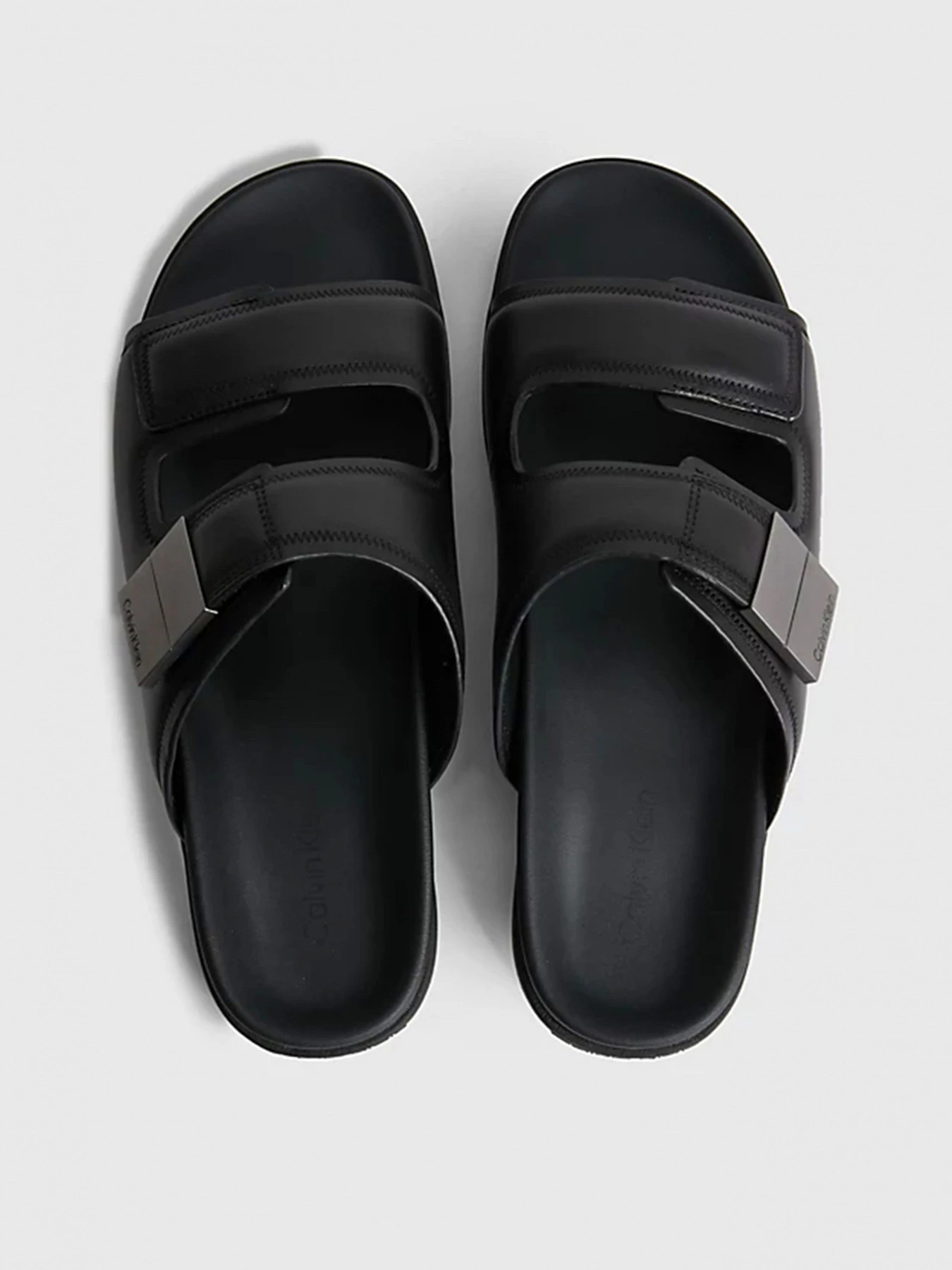Шлёпанцы Calvin Klein модель HM0HM00945-BEH Шлёпанцы Calvin Klein модель HM0HM00945-BEH Фото