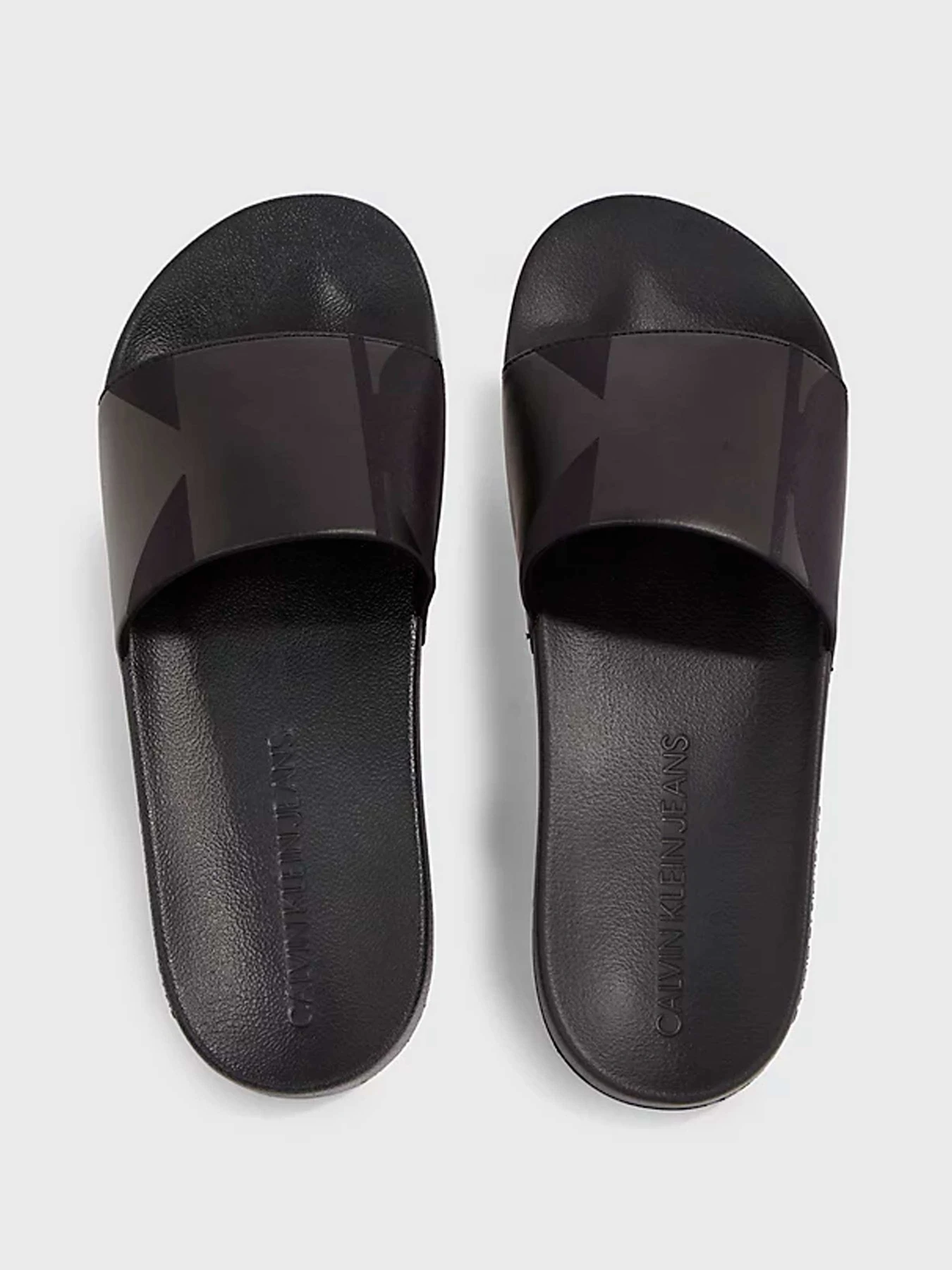 Шлёпанцы Calvin Klein модель YM0YM00834-BEH Шлёпанцы Calvin Klein модель YM0YM00834-BEH Фото