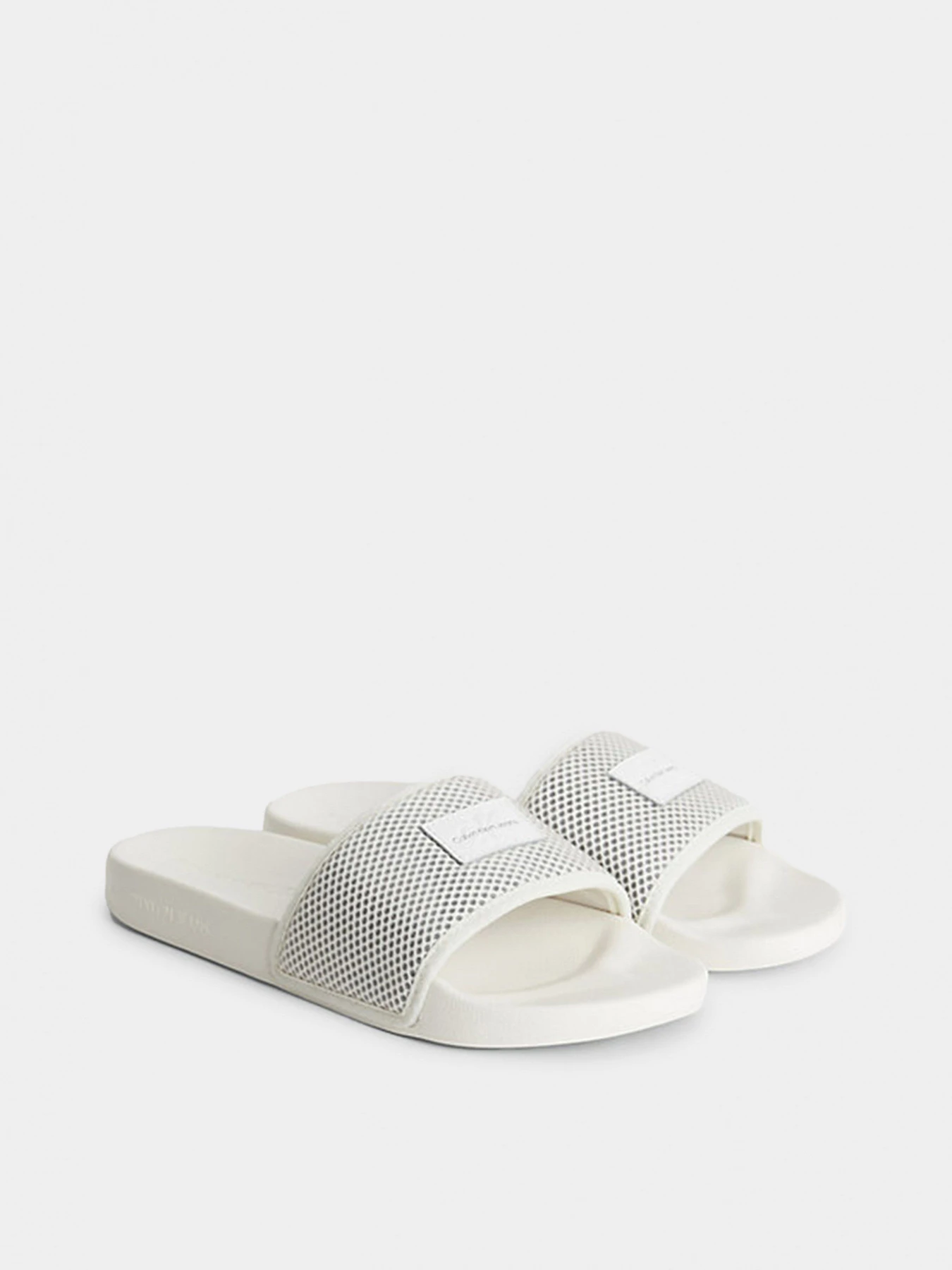 Шлёпанцы Calvin Klein модель YW0YW00997-0K7 Шлёпанцы Calvin Klein модель YW0YW00997-0K7 Фото