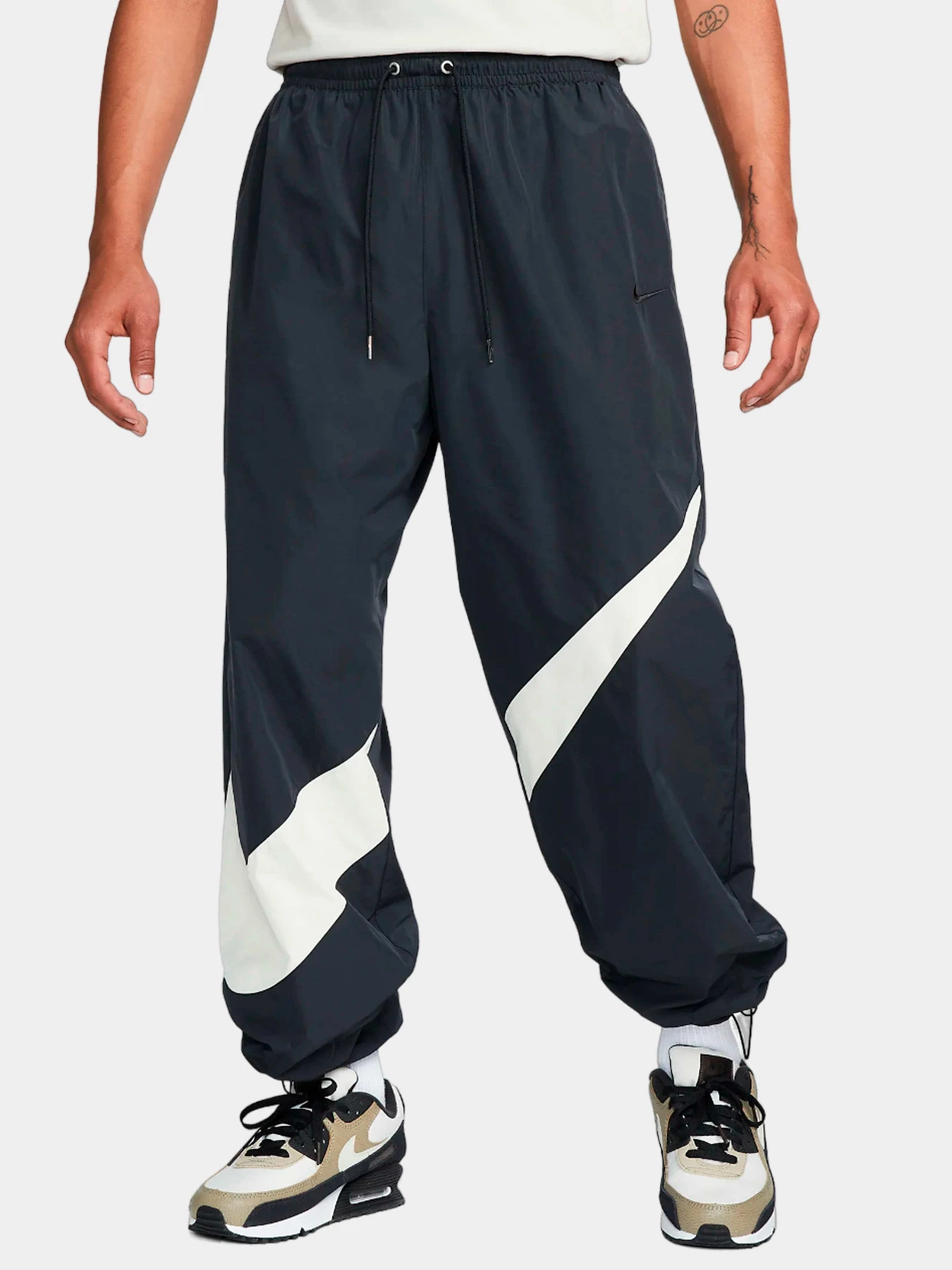 Брюки NIKE модель FB7880-010 Брюки NIKE модель FB7880-010 Фото
