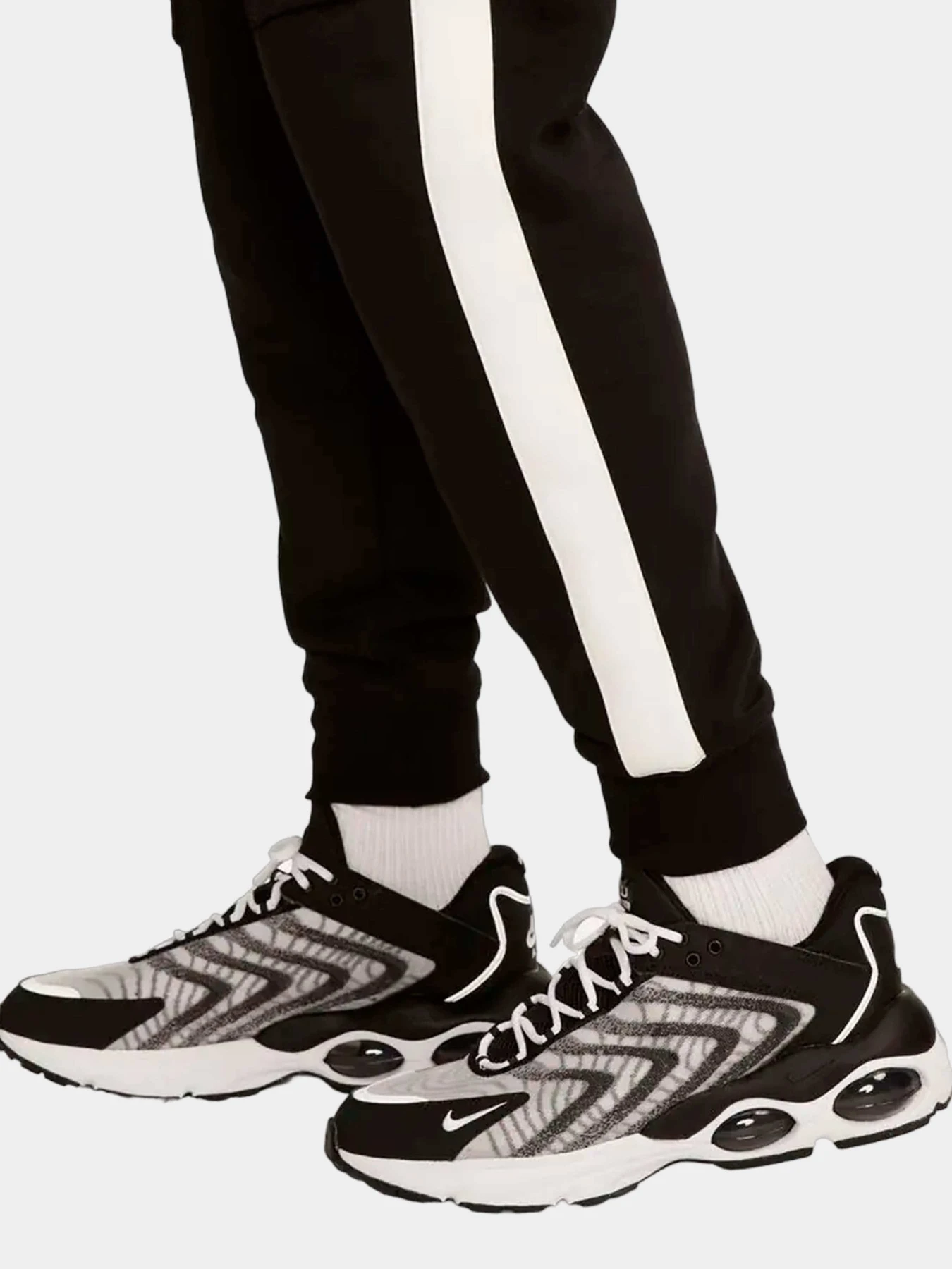 Брюки NIKE модель FN7693-010 Брюки NIKE модель FN7693-010 Фото