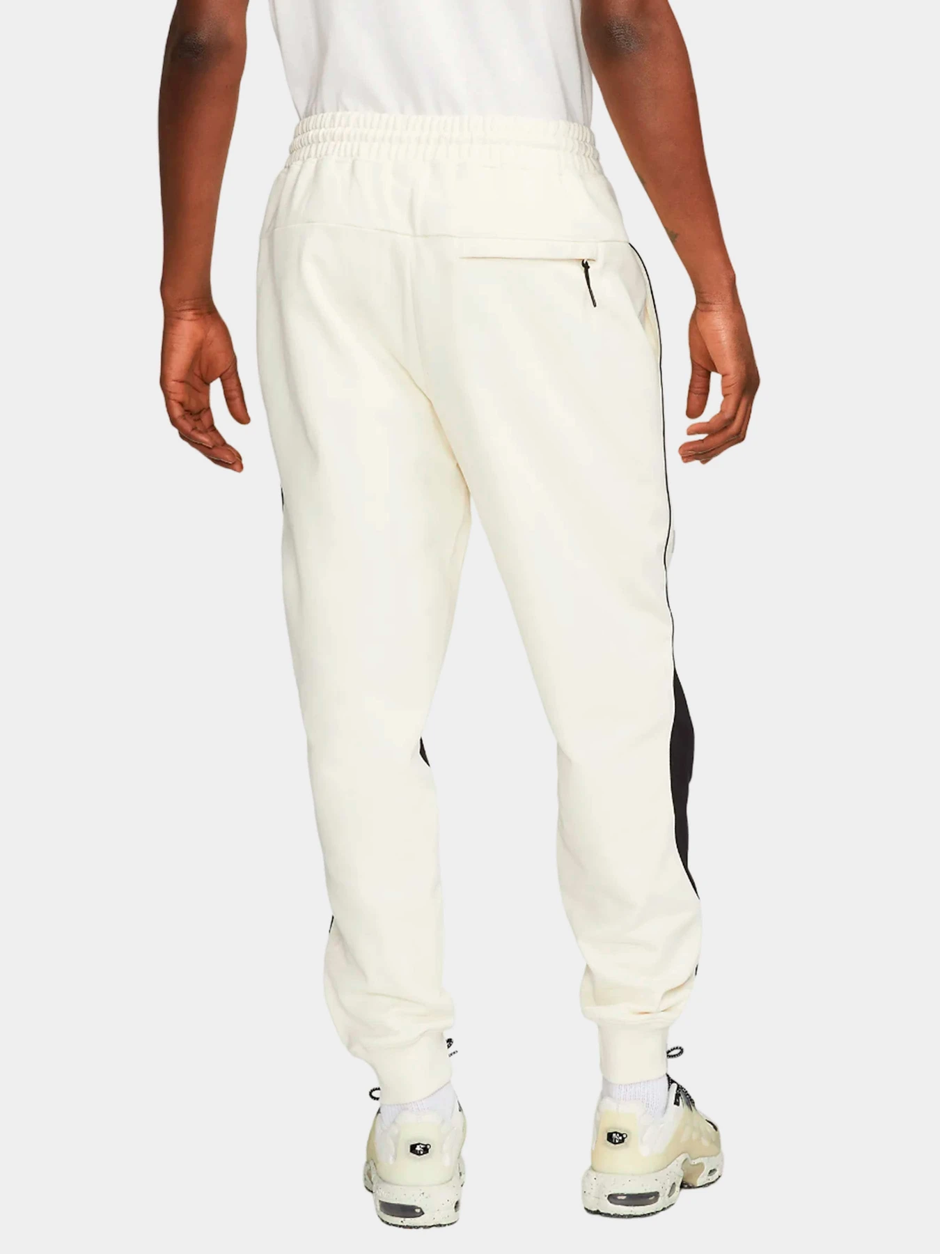 Брюки NIKE модель DX0564-113 Брюки NIKE модель DX0564-113 Фото