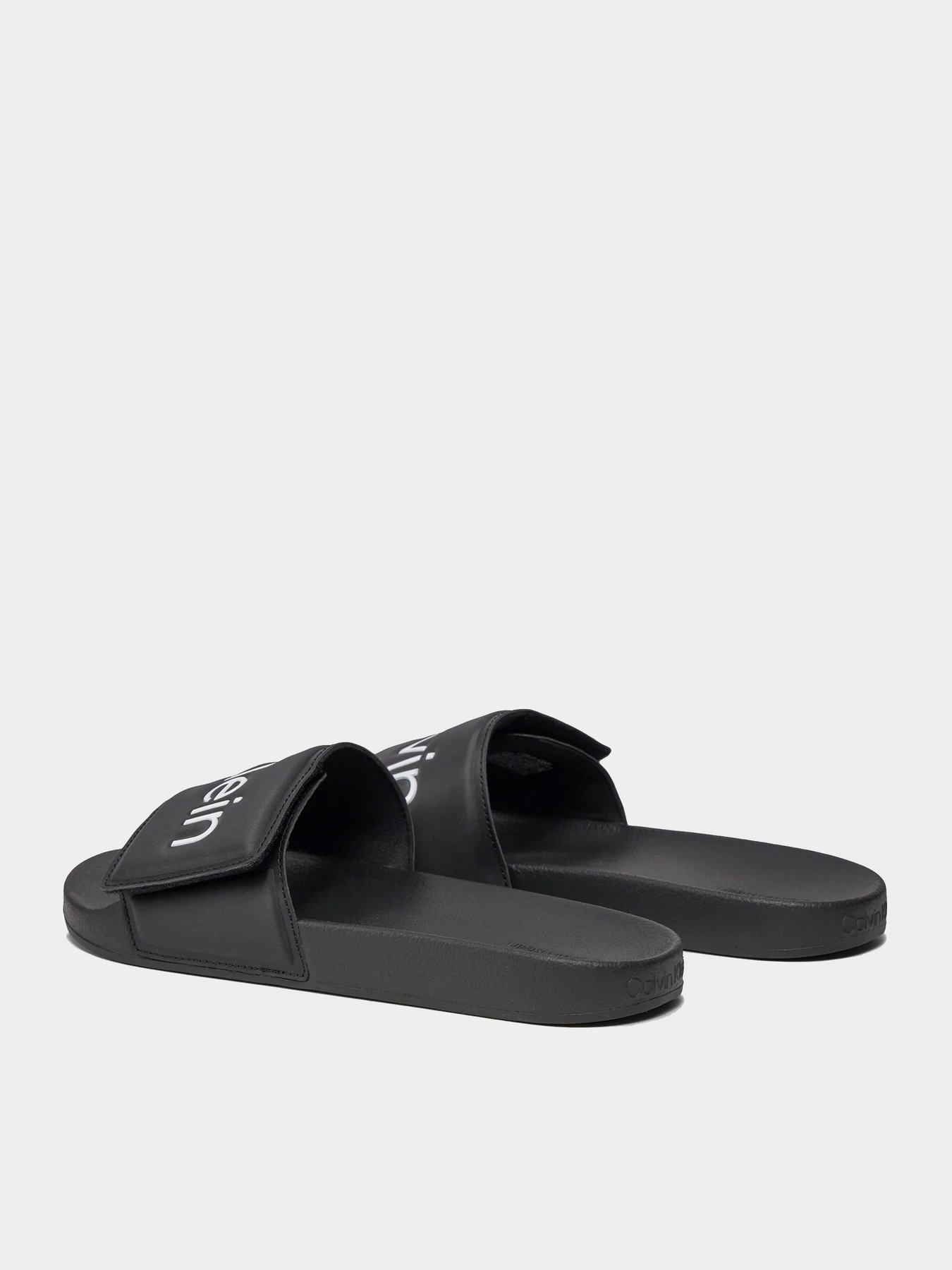 Шлёпанцы Calvin Klein модель HM0HM01357-BEH Шлёпанцы Calvin Klein модель HM0HM01357-BEH Фото
