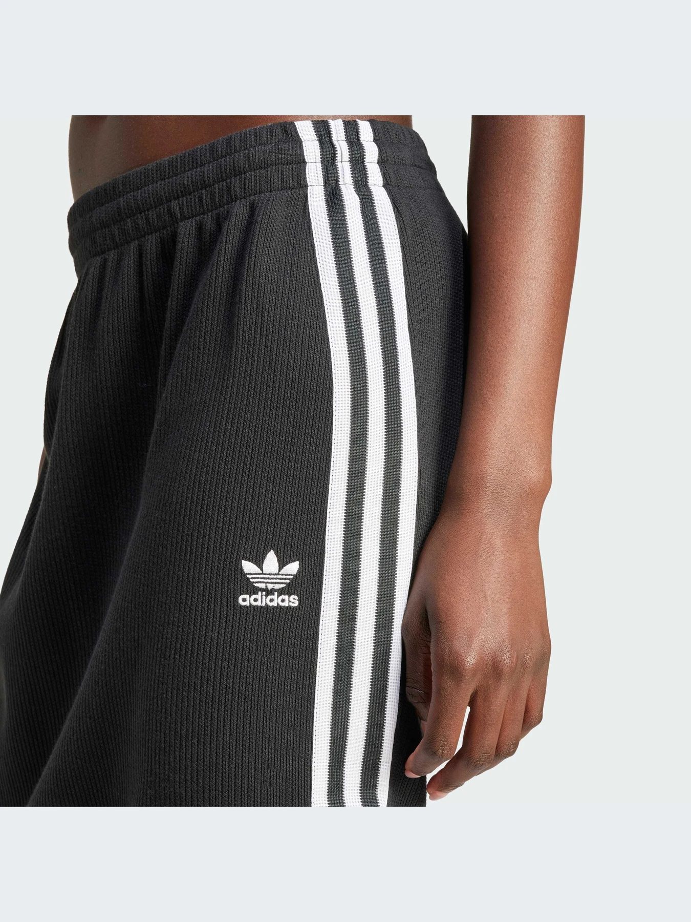 Юбки Adidas Adicolor модель IY7279-KZ Юбки Adidas Adicolor модель IY7279-KZ Фото