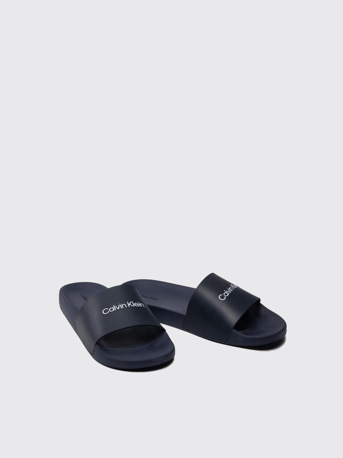 Шлёпанцы Calvin Klein модель HM0HM00455-DW4 Шлёпанцы Calvin Klein модель HM0HM00455-DW4 Фото