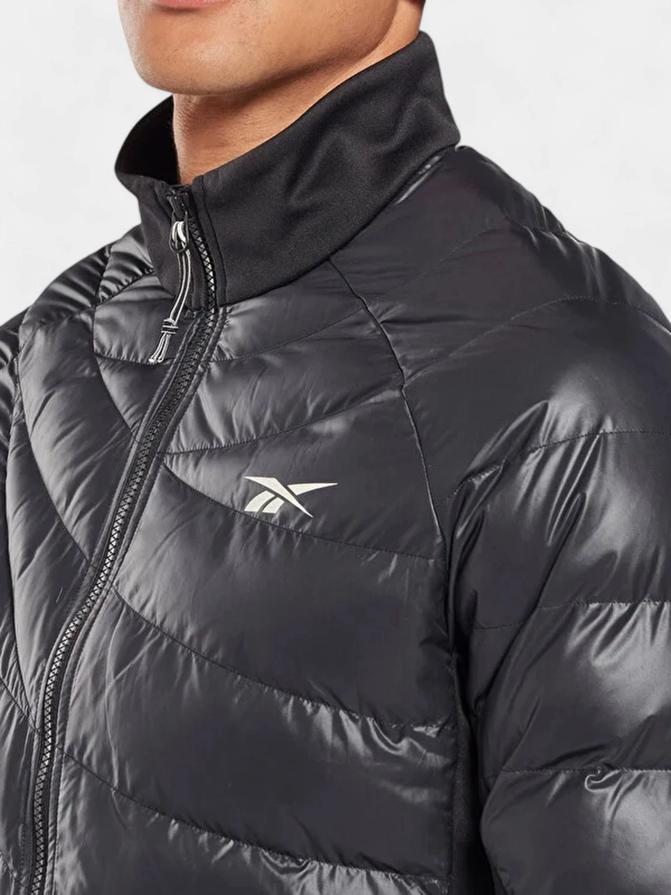 Куртки и дубленки Reebok модель HG8926 Фото