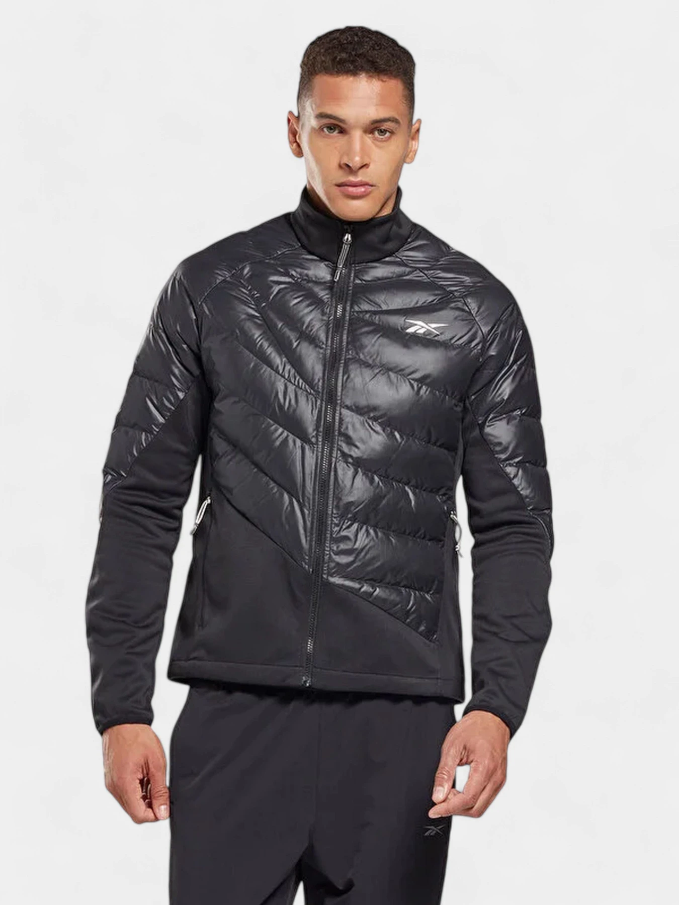 Куртки и дубленки Reebok модель HG8926 Фото