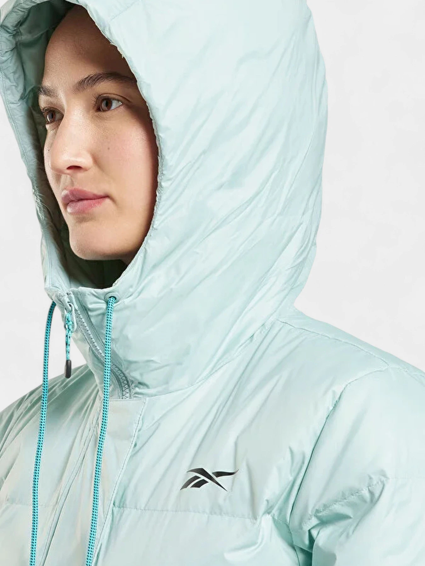 Куртки и дубленки Reebok модель HG8947 Фото