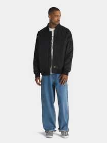 Куртки и дубленки Vans модель VN000HMQBLK1 Фото