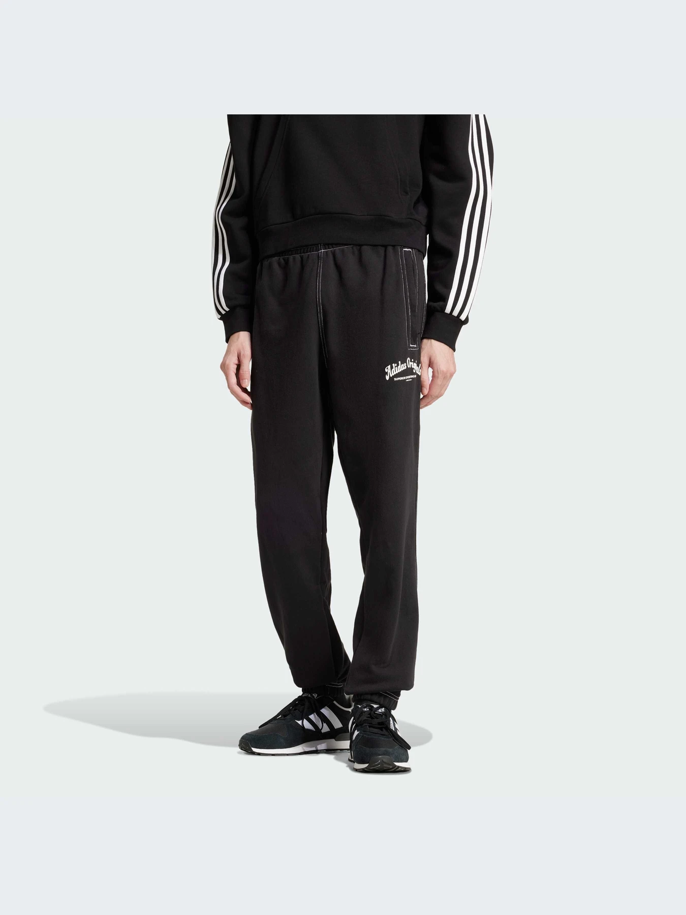 Брюки Adidas Graphics модель JP4487-KZ Брюки Adidas Graphics модель JP4487-KZ Фото
