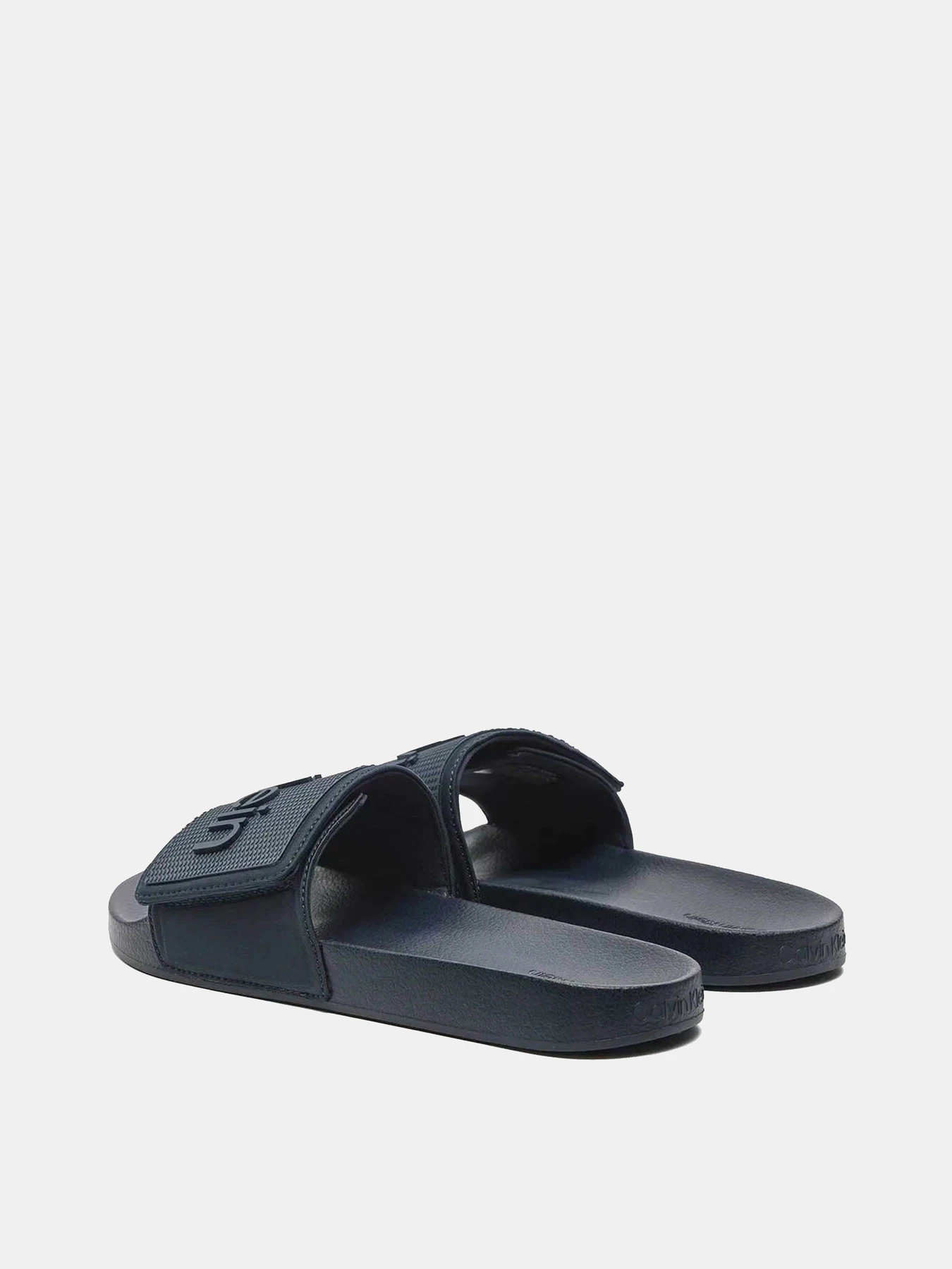 Шлёпанцы Calvin Klein модель HM0HM01437-DW4 Шлёпанцы Calvin Klein модель HM0HM01437-DW4 Фото