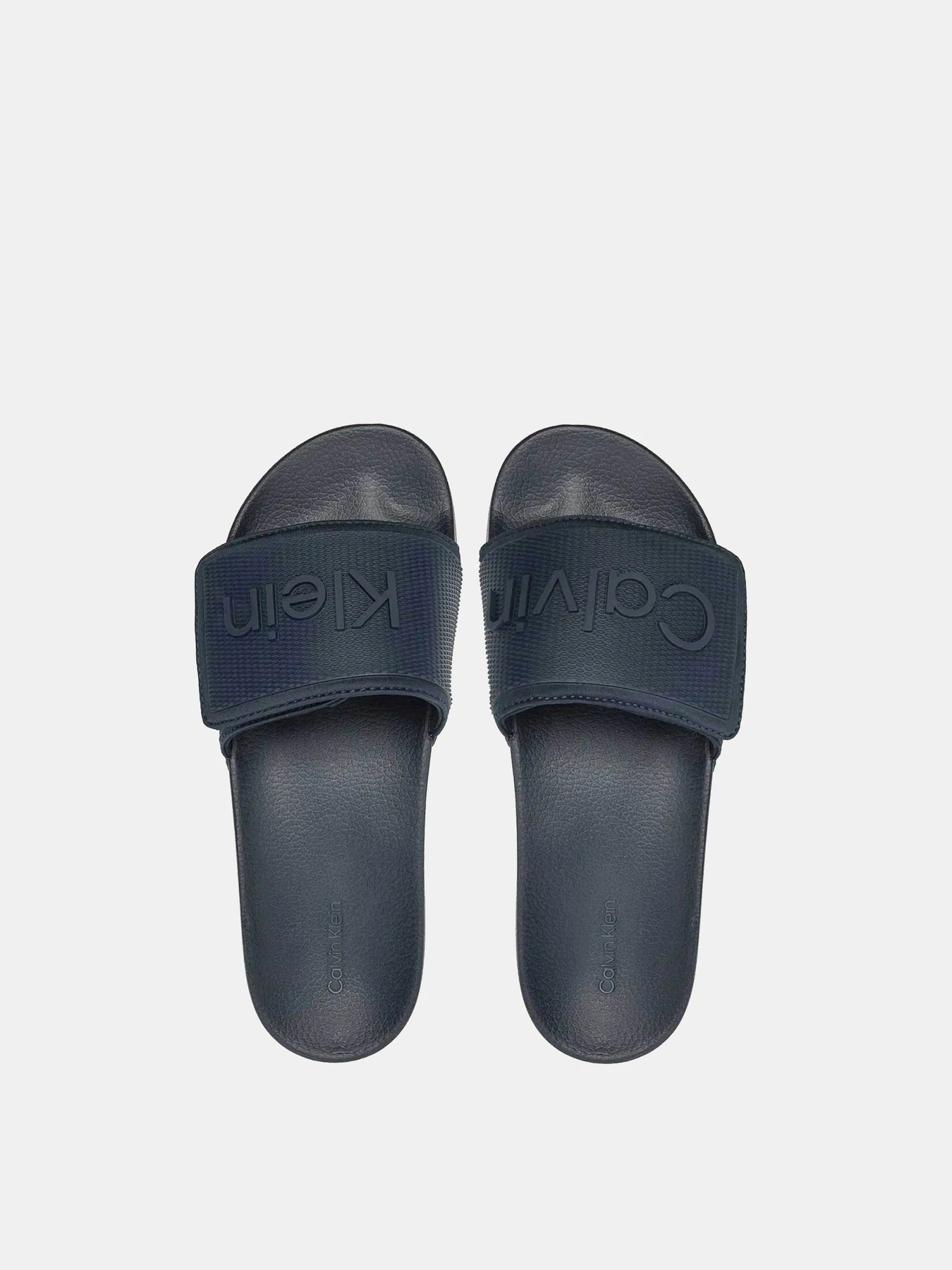Шлёпанцы Calvin Klein модель HM0HM01437-DW4 Шлёпанцы Calvin Klein модель HM0HM01437-DW4 Фото