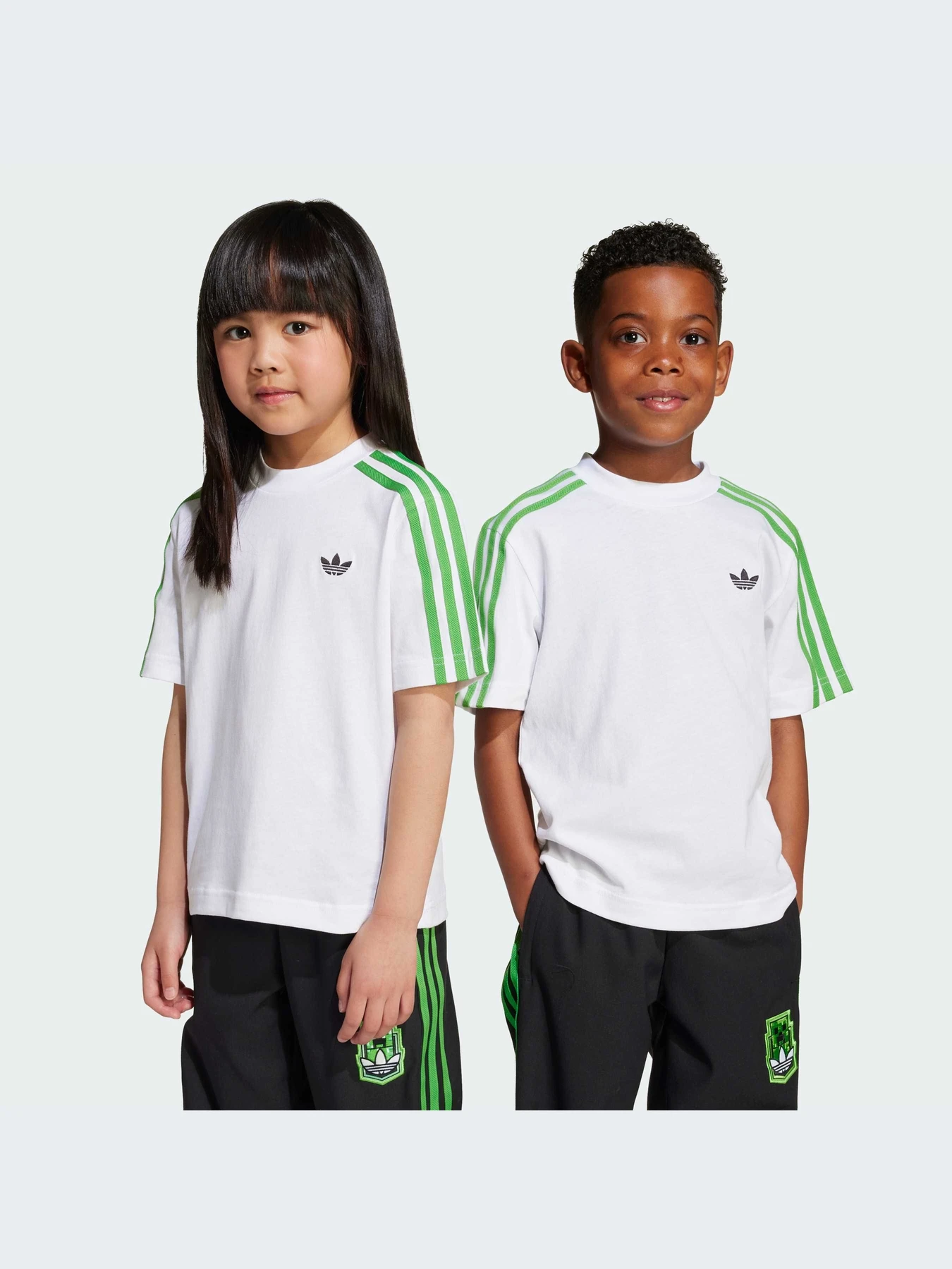 Футболки и поло Adidas Graphics модель JW5329-KZ Футболки и поло Adidas Graphics модель JW5329-KZ Фото