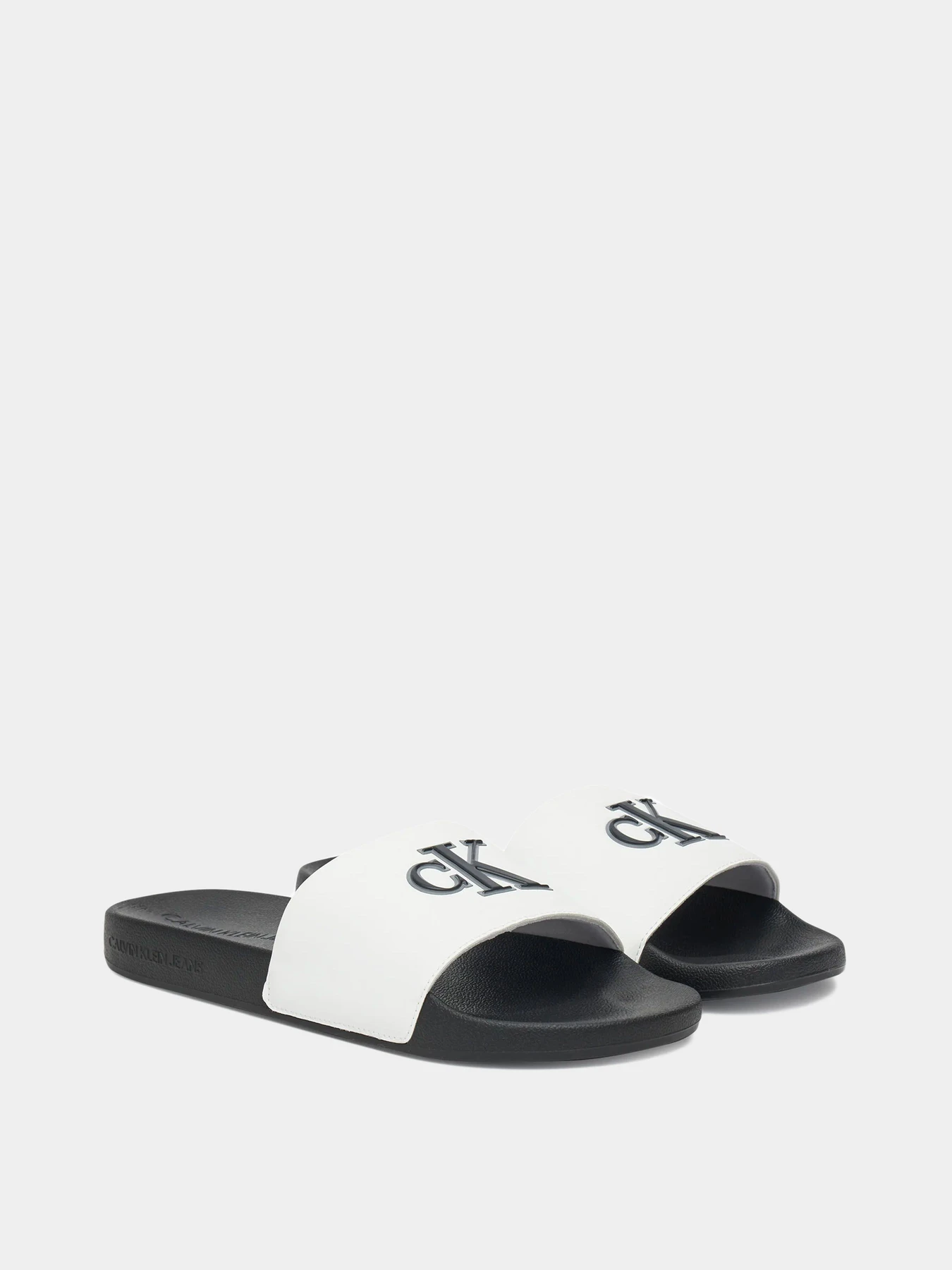 Шлёпанцы Calvin Klein модель YM0YM01281-01W Шлёпанцы Calvin Klein модель YM0YM01281-01W Фото