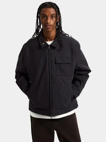 Куртки и дубленки Vans модель VN000R8XBLK1 Фото