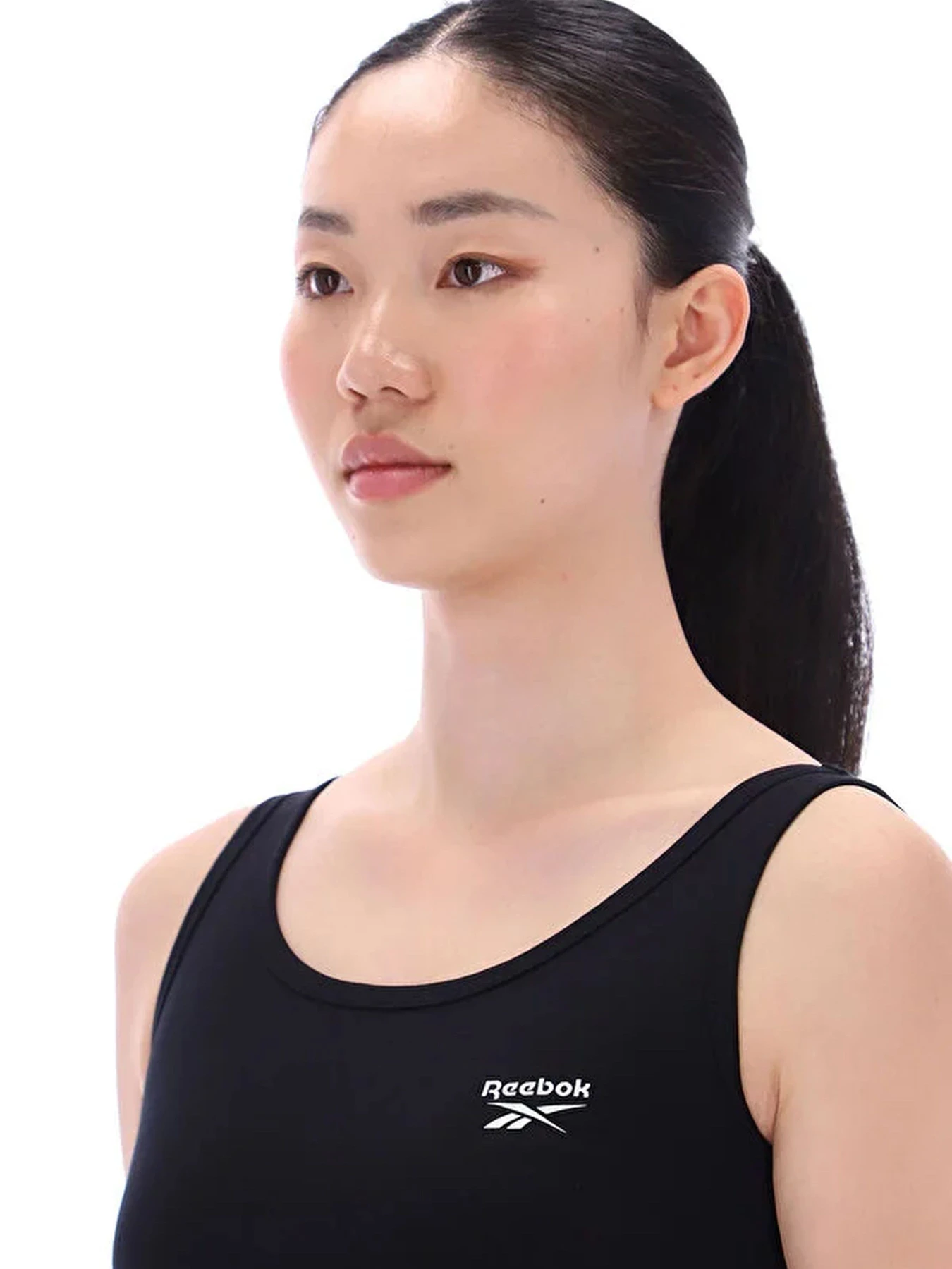 Футболки и поло Reebok LUNA SCOOP NECK SMALL LOG модель 102255721 Футболки и поло Reebok LUNA SCOOP NECK SMALL LOG модель 102255721 Фото