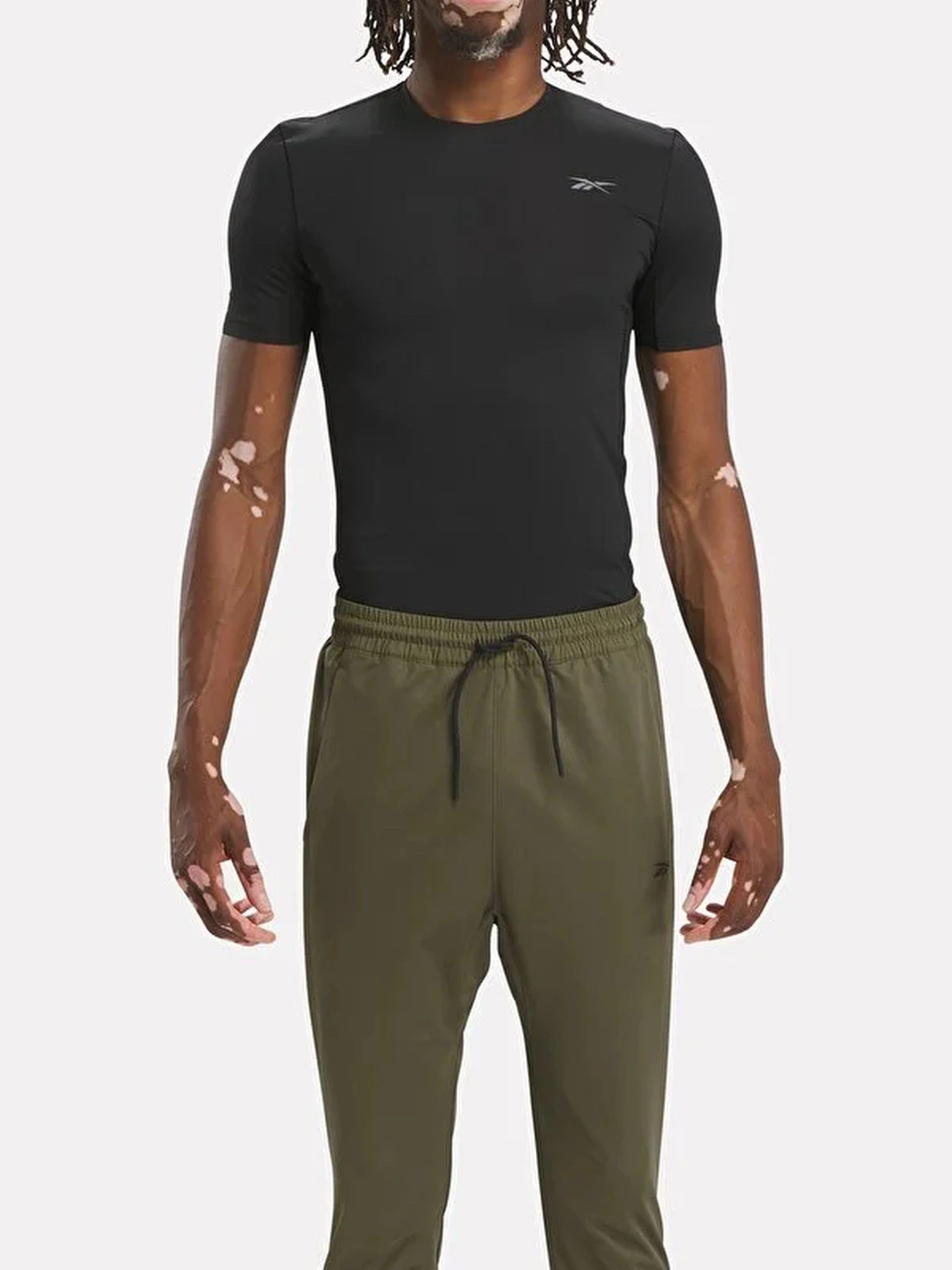 Футболки и поло Reebok COMPRESSION T-SHIRT модель 101552328 Футболки и поло Reebok COMPRESSION T-SHIRT модель 101552328 Фото
