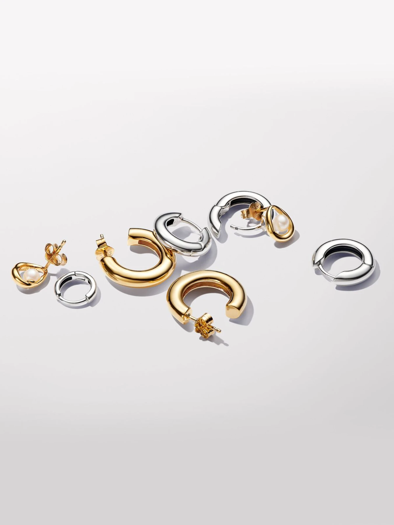 Серьги-кольца PANDORA Essence модель 293286C00 Фото