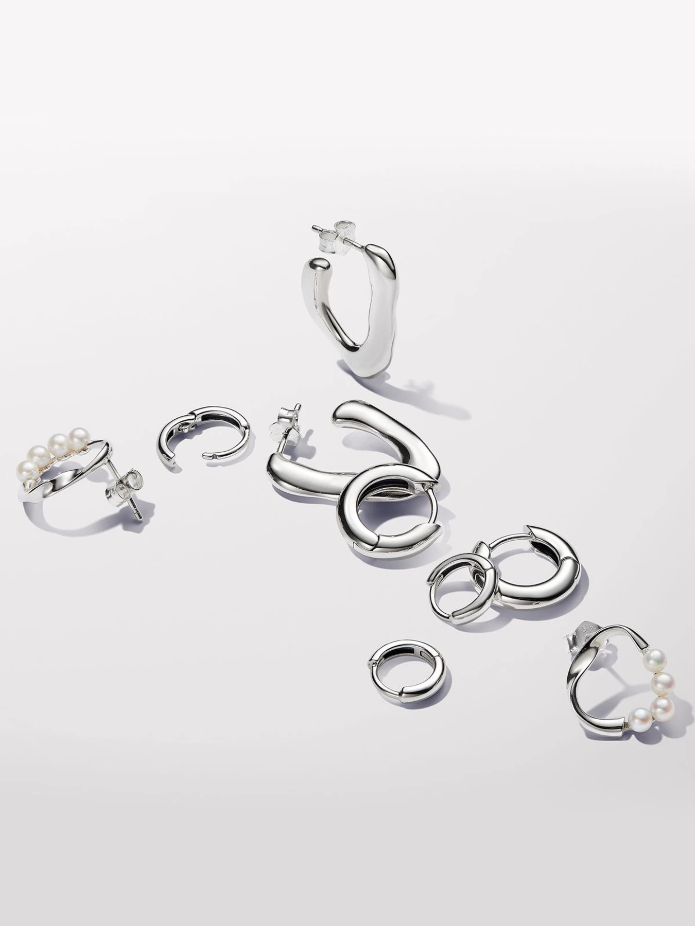 Серьги-кольца PANDORA Essence модель 293290C00 Фото