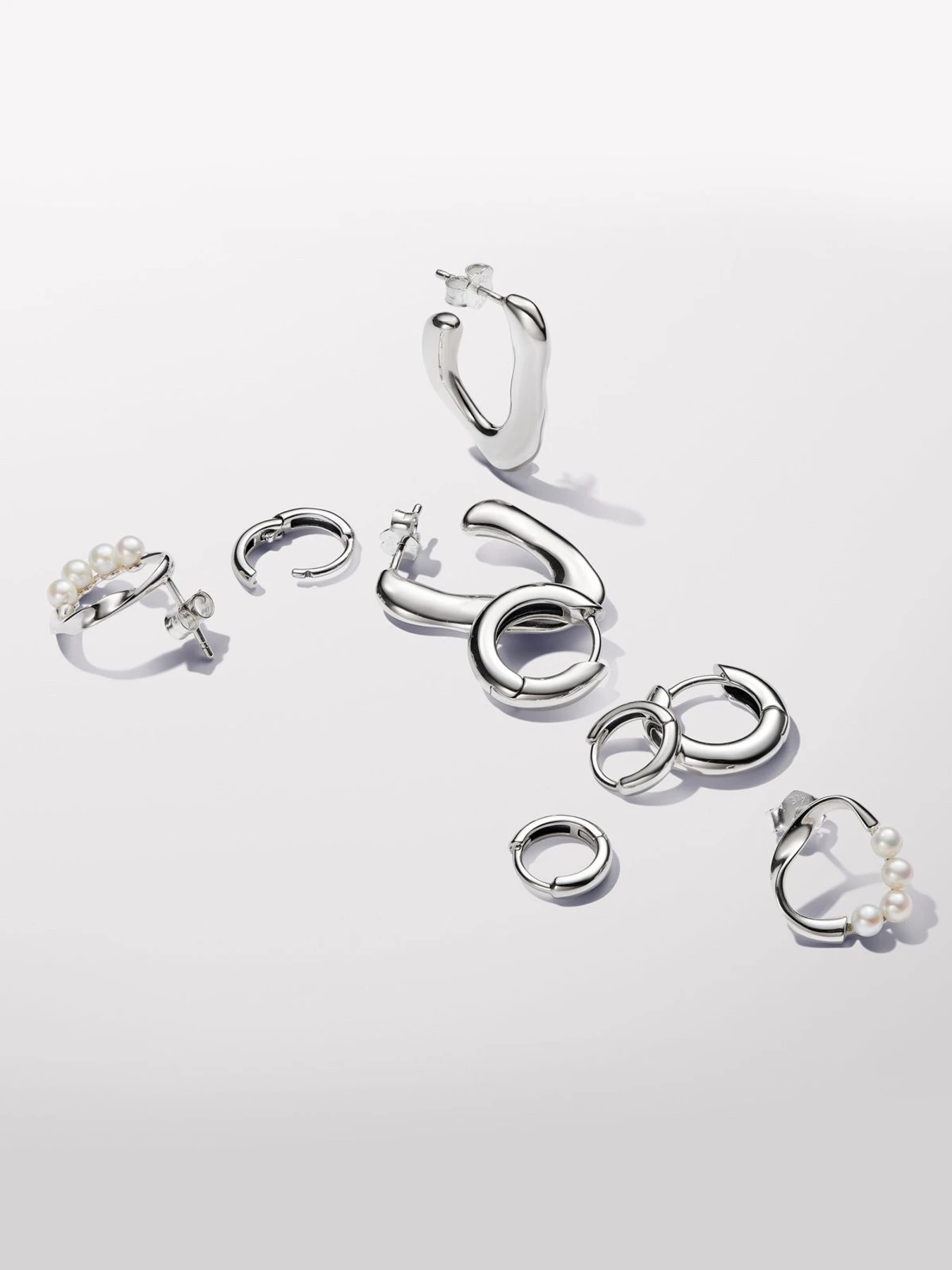 Серьги-кольца PANDORA Essence модель 293320C00 Фото