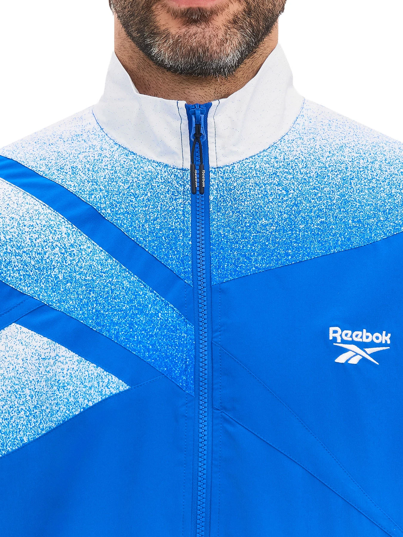 Куртки и дубленки Reebok VECTOR SPRAY PRINT TRACK модель 102248291 Куртки и дубленки Reebok VECTOR SPRAY PRINT TRACK модель 102248291 Фото