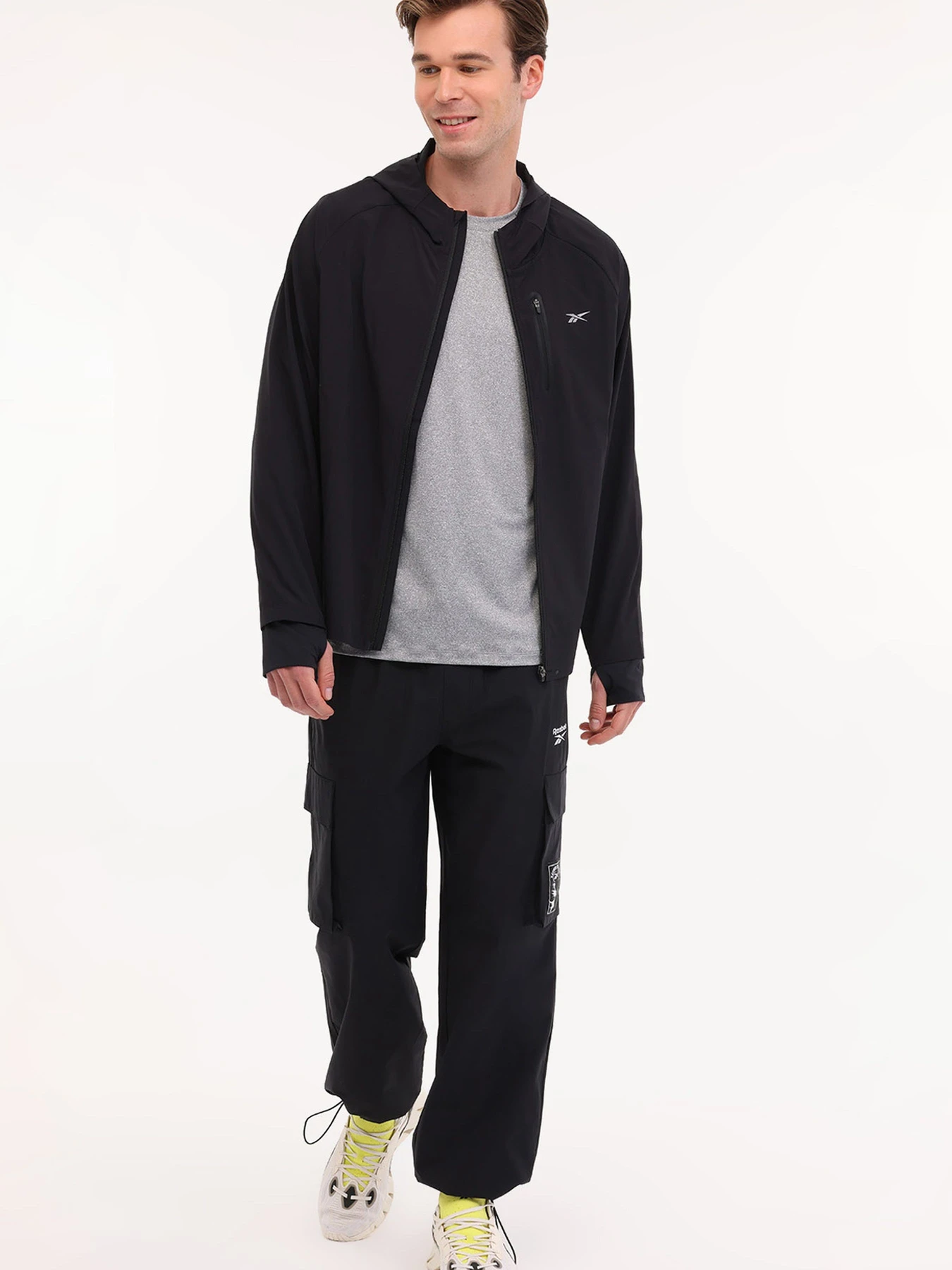 Куртки и дубленки Reebok ERLING RUNNING JACKET модель 102050498 Куртки и дубленки Reebok ERLING RUNNING JACKET модель 102050498 Фото