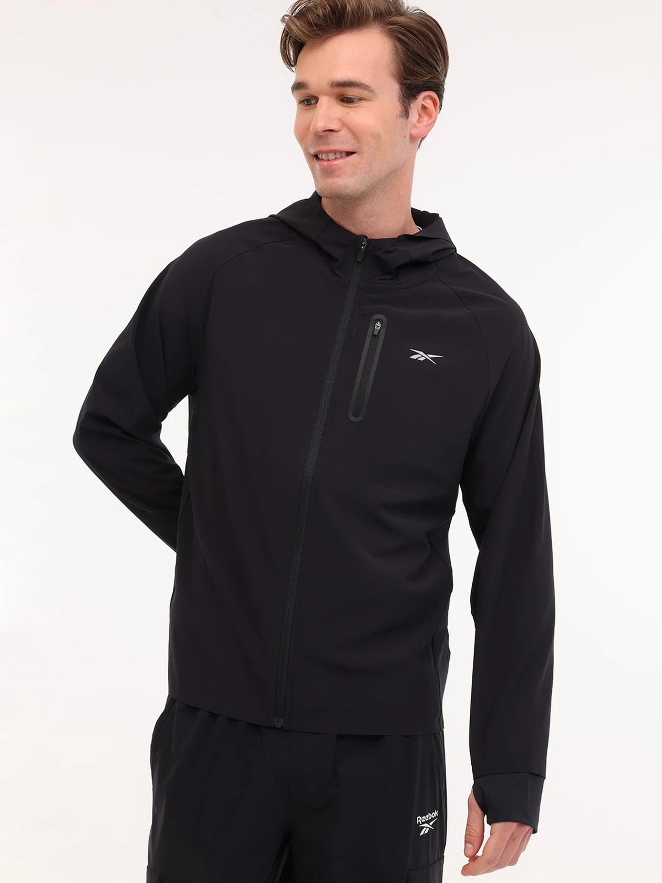 Куртки и дубленки Reebok ERLING RUNNING JACKET модель 102050498 Куртки и дубленки Reebok ERLING RUNNING JACKET модель 102050498 Фото