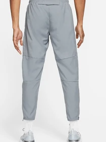 Брюки NIKE M NK DF CHLLGR WVN PANT модель 101513793 Фото