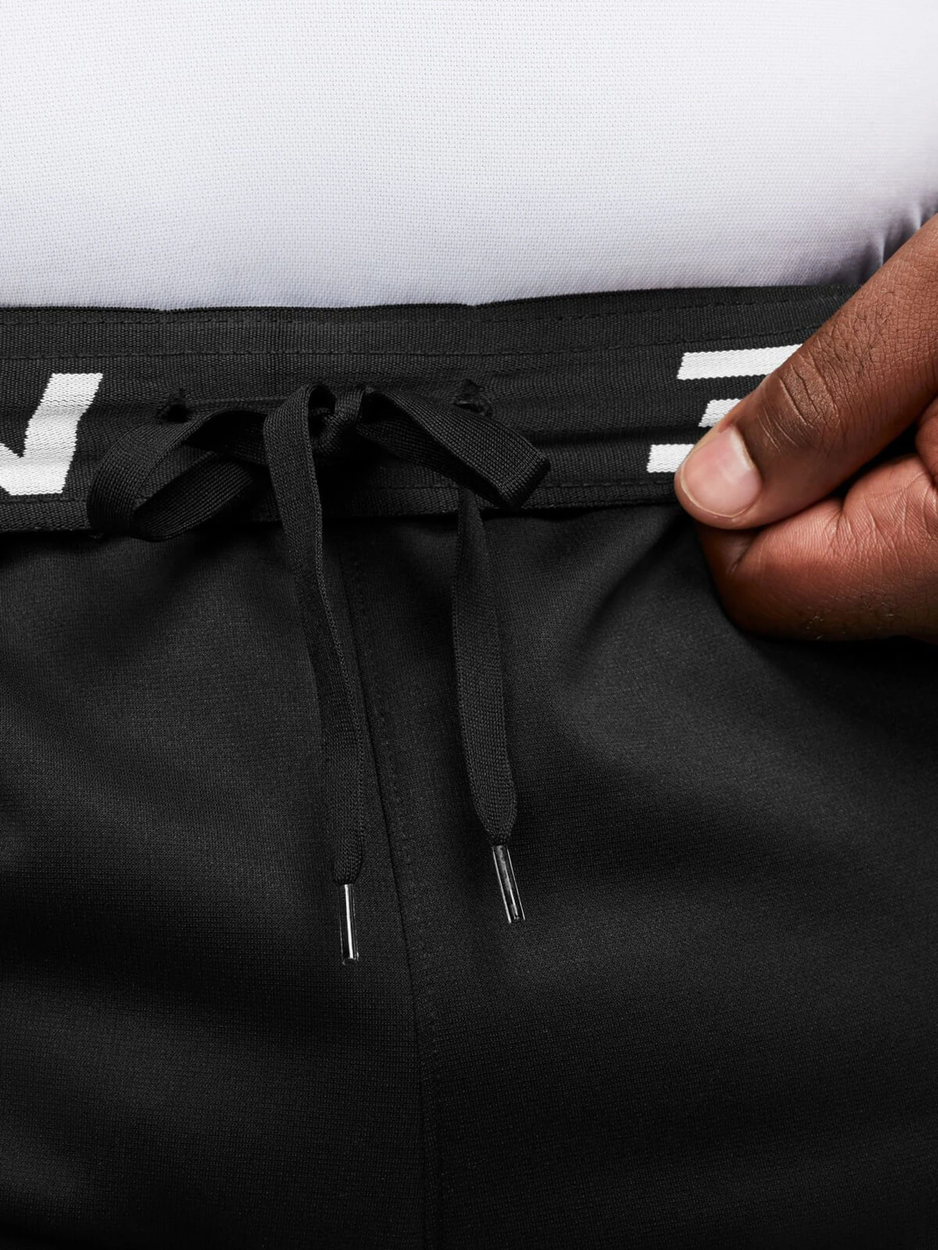 Брюки NIKE M NK TF PANT TAPER модель 101827202 Брюки NIKE M NK TF PANT TAPER модель 101827202 Фото
