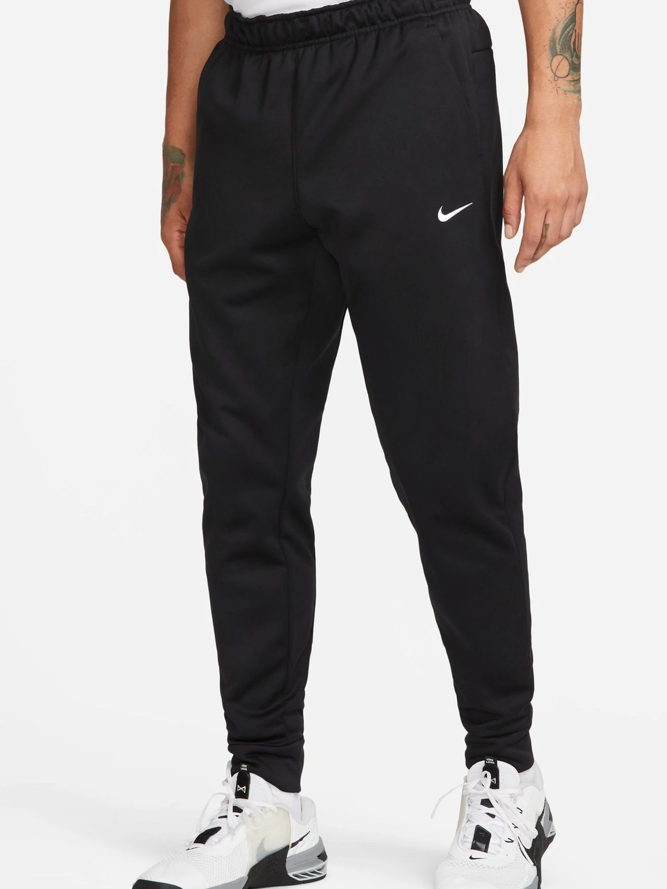 Брюки NIKE M NK TF PANT TAPER модель 101827202 Брюки NIKE M NK TF PANT TAPER модель 101827202 Фото