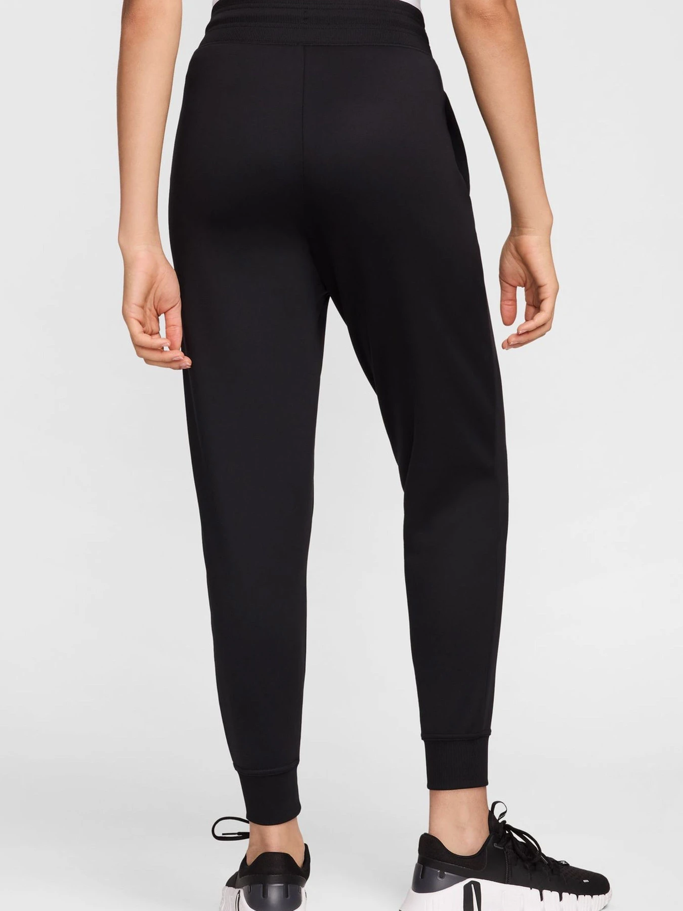 Брюки NIKE W NK ONE TF JOGGER PANT модель 102049641 Брюки NIKE W NK ONE TF JOGGER PANT модель 102049641 Фото