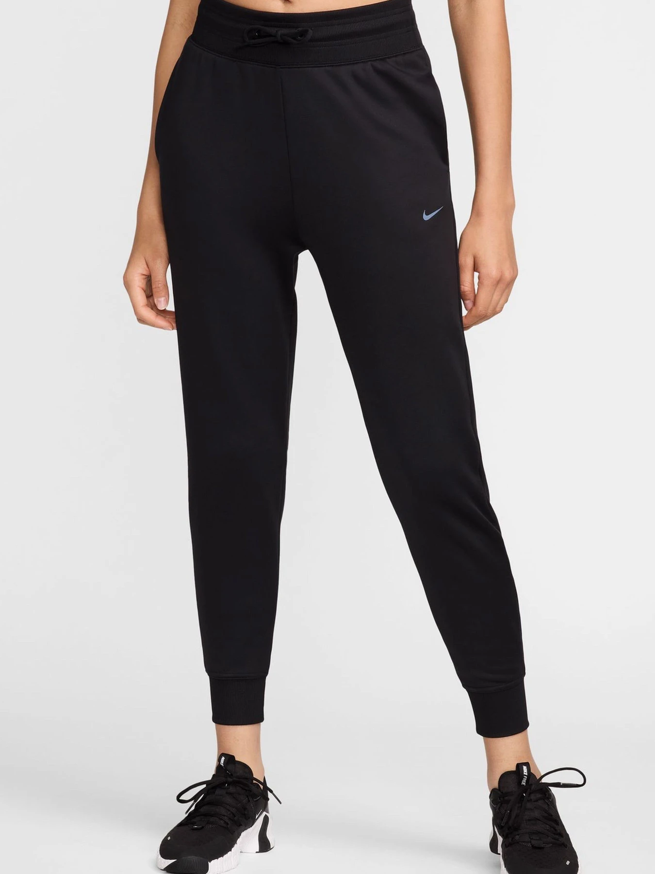 Брюки NIKE W NK ONE TF JOGGER PANT модель 102049641 Брюки NIKE W NK ONE TF JOGGER PANT модель 102049641 Фото