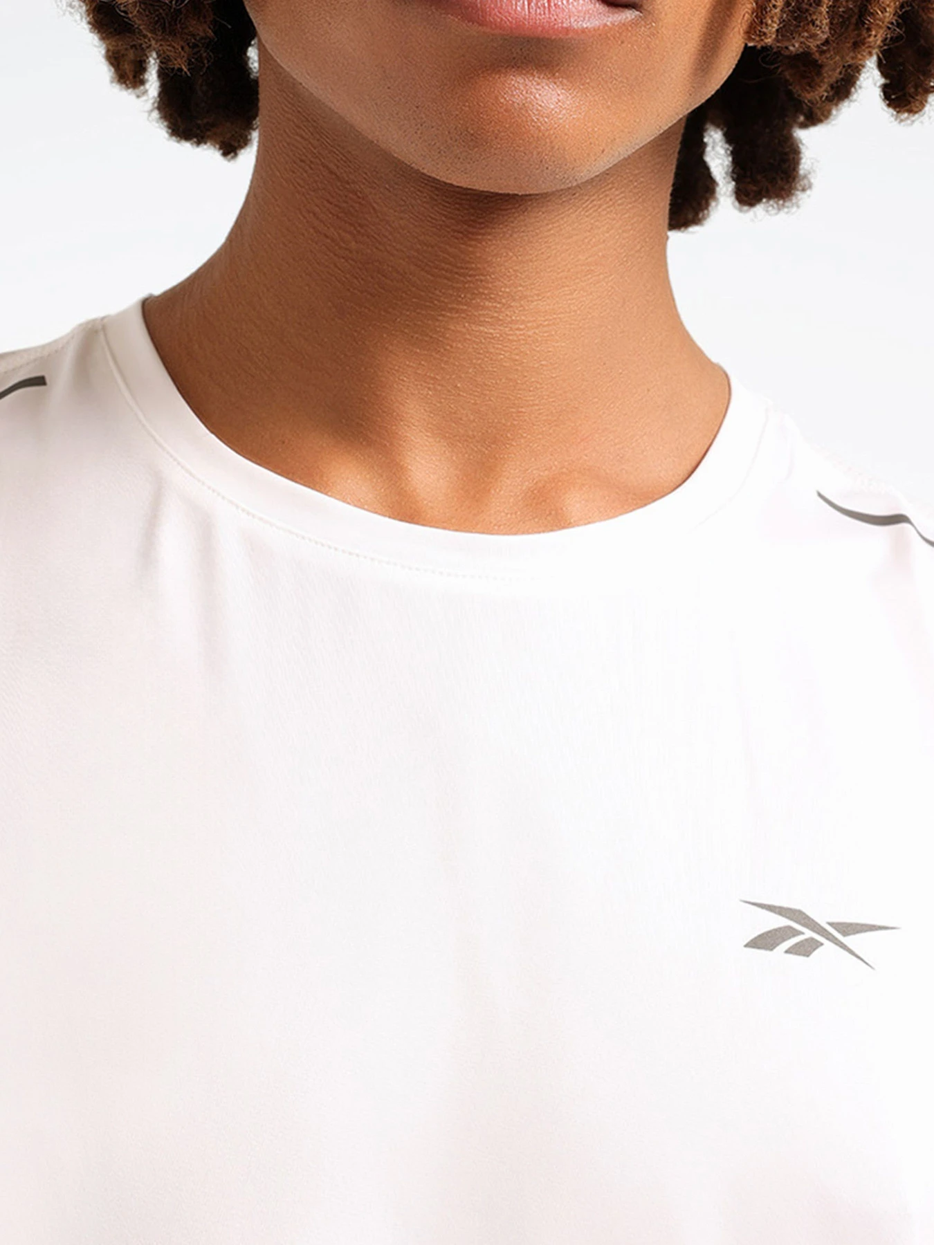 Футболки и поло Reebok NEON SLVLSS TEE модель 102050501 Футболки и поло Reebok NEON SLVLSS TEE модель 102050501 Фото