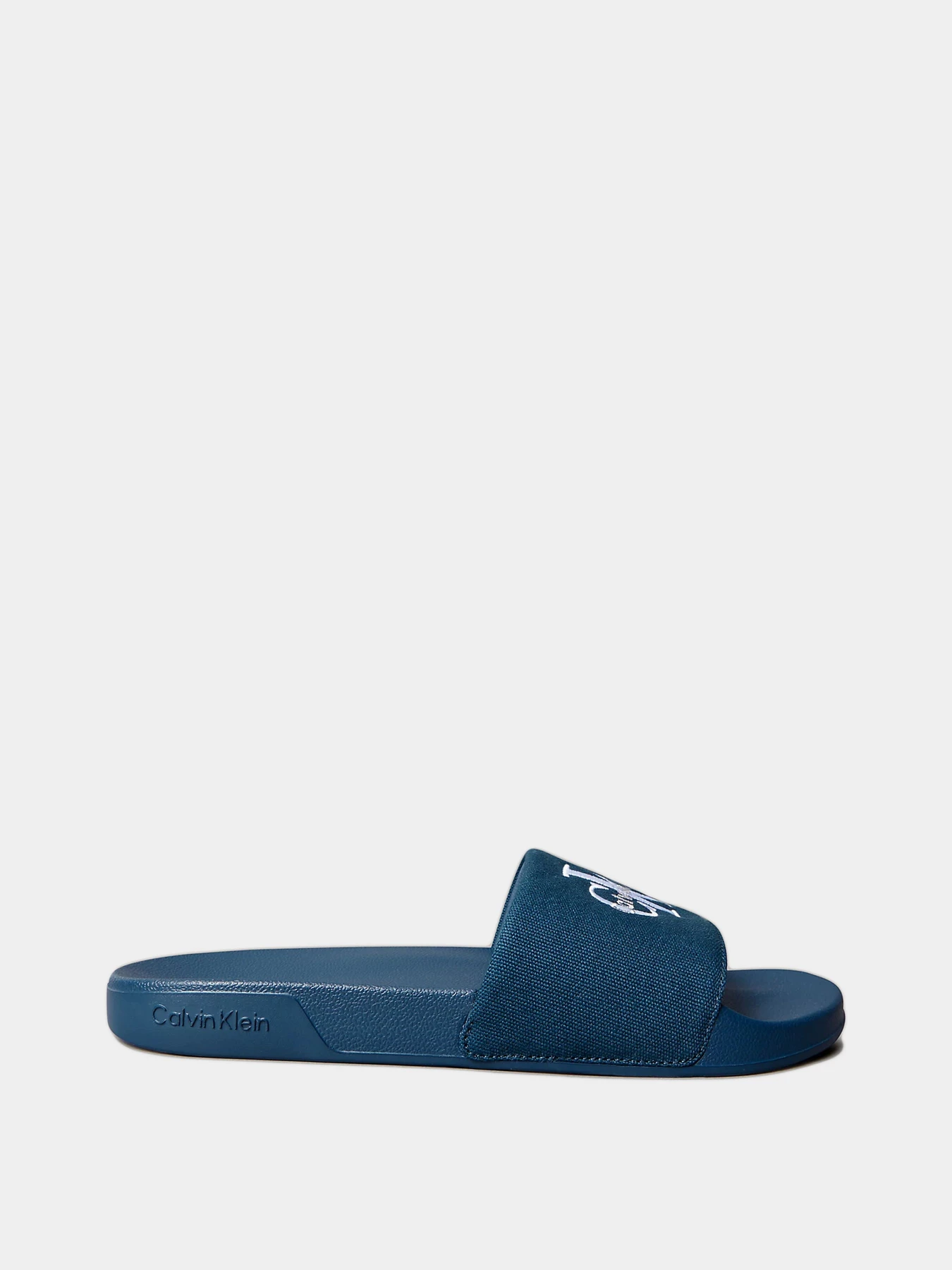 Шлёпанцы Calvin Klein модель YM0YM01393-BAI Шлёпанцы Calvin Klein модель YM0YM01393-BAI Фото