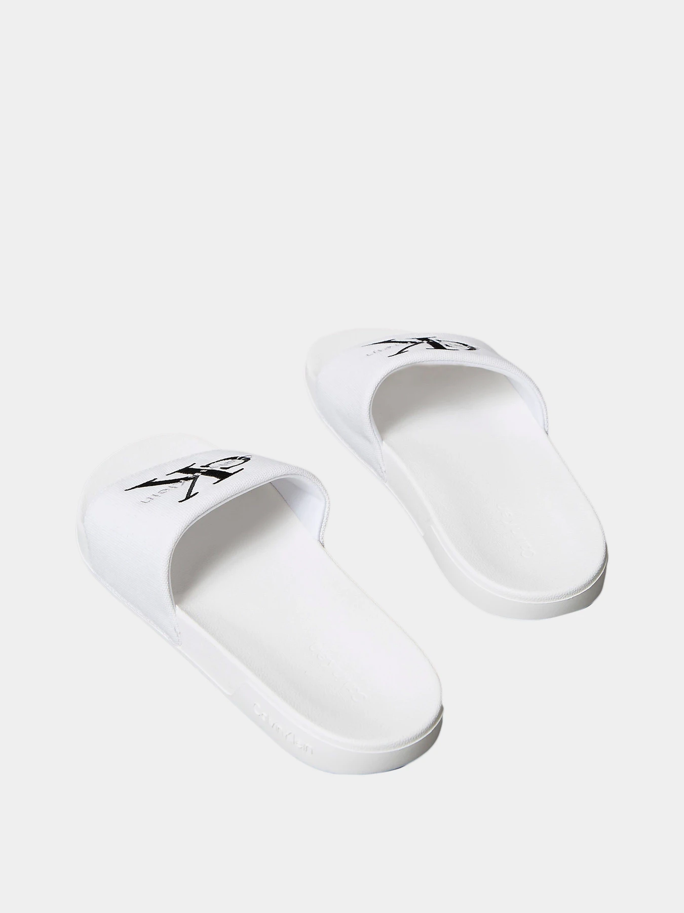 Шлёпанцы Calvin Klein модель YM0YM01393-0K4 Шлёпанцы Calvin Klein модель YM0YM01393-0K4 Фото