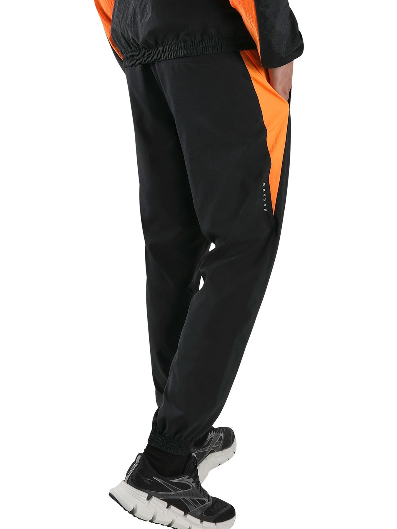 Брюки Reebok ID RUNNING PANTS модель 102348945 Брюки Reebok ID RUNNING PANTS модель 102348945 Фото