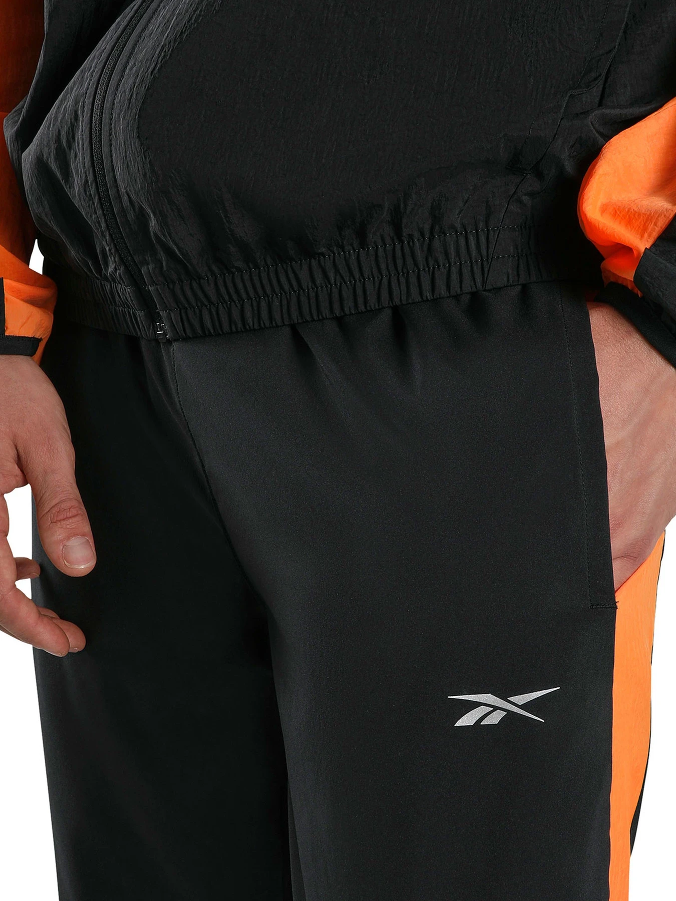Брюки Reebok ID RUNNING PANTS модель 102348945 Брюки Reebok ID RUNNING PANTS модель 102348945 Фото