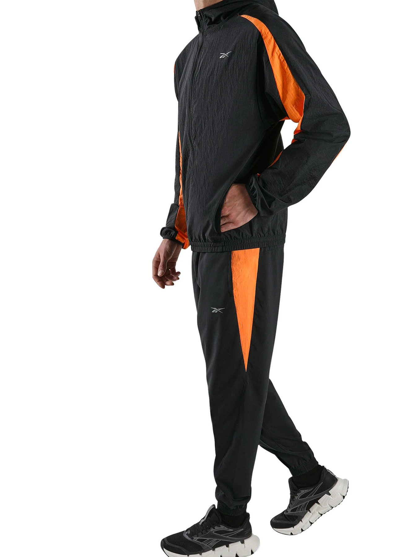 Брюки Reebok ID RUNNING PANTS модель 102348945 Брюки Reebok ID RUNNING PANTS модель 102348945 Фото