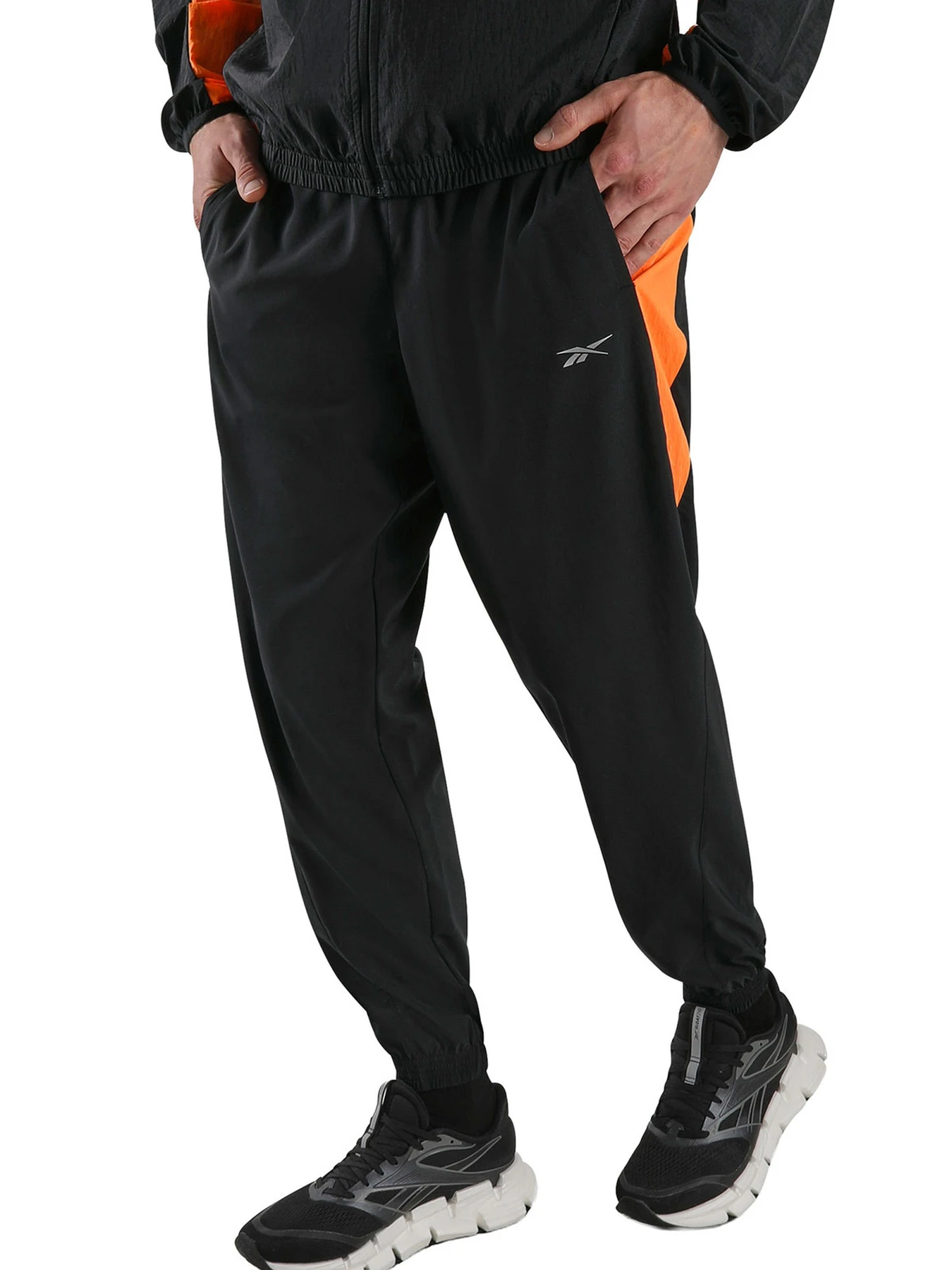 Брюки Reebok ID RUNNING PANTS модель 102348945 Брюки Reebok ID RUNNING PANTS модель 102348945 Фото