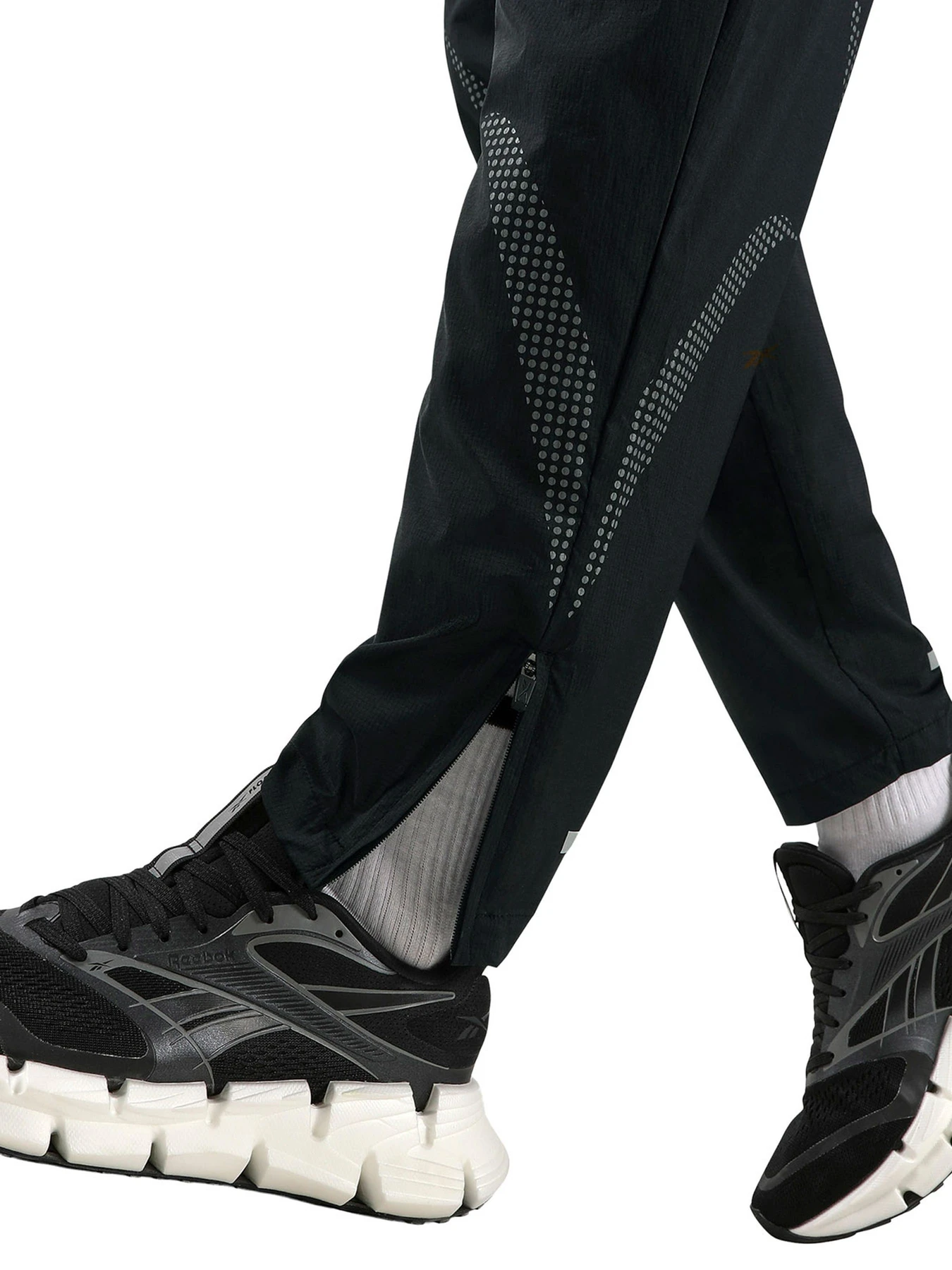 Брюки Reebok RBK-LAB 7/8 WOVEN TECH PA модель 102352820 Брюки Reebok RBK-LAB 7/8 WOVEN TECH PA модель 102352820 Фото