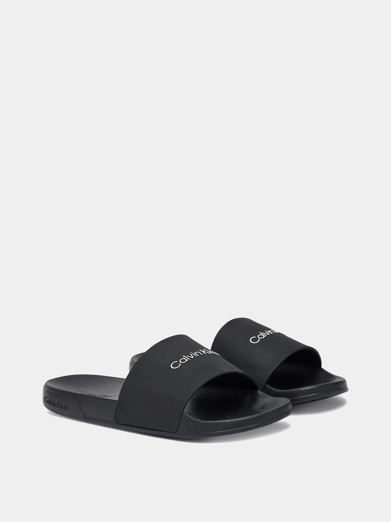 Шлёпанцы Calvin Klein модель HM0HM02107-0GJ Шлёпанцы Calvin Klein модель HM0HM02107-0GJ Фото