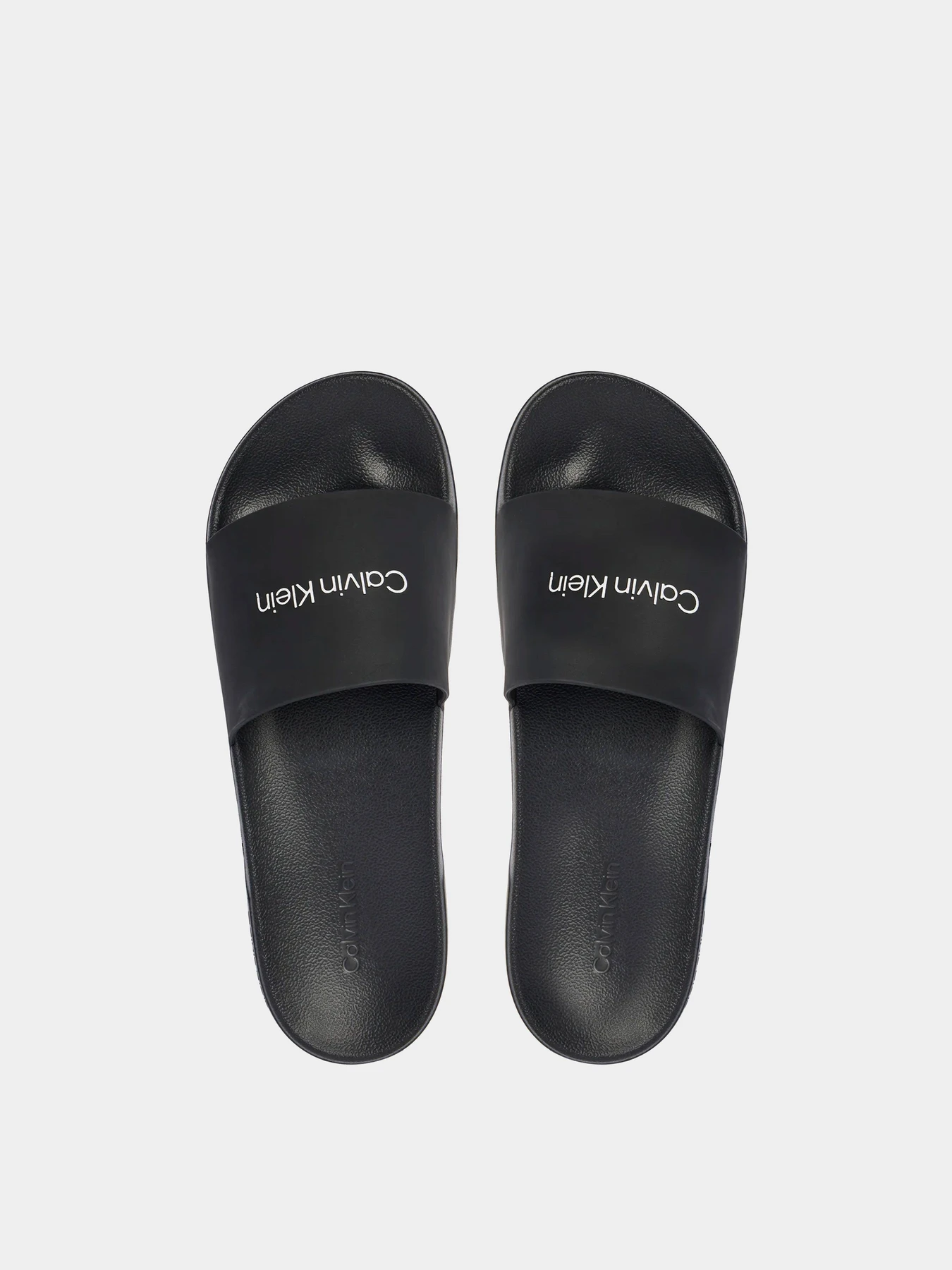 Шлёпанцы Calvin Klein модель HM0HM02107-0GJ Шлёпанцы Calvin Klein модель HM0HM02107-0GJ Фото