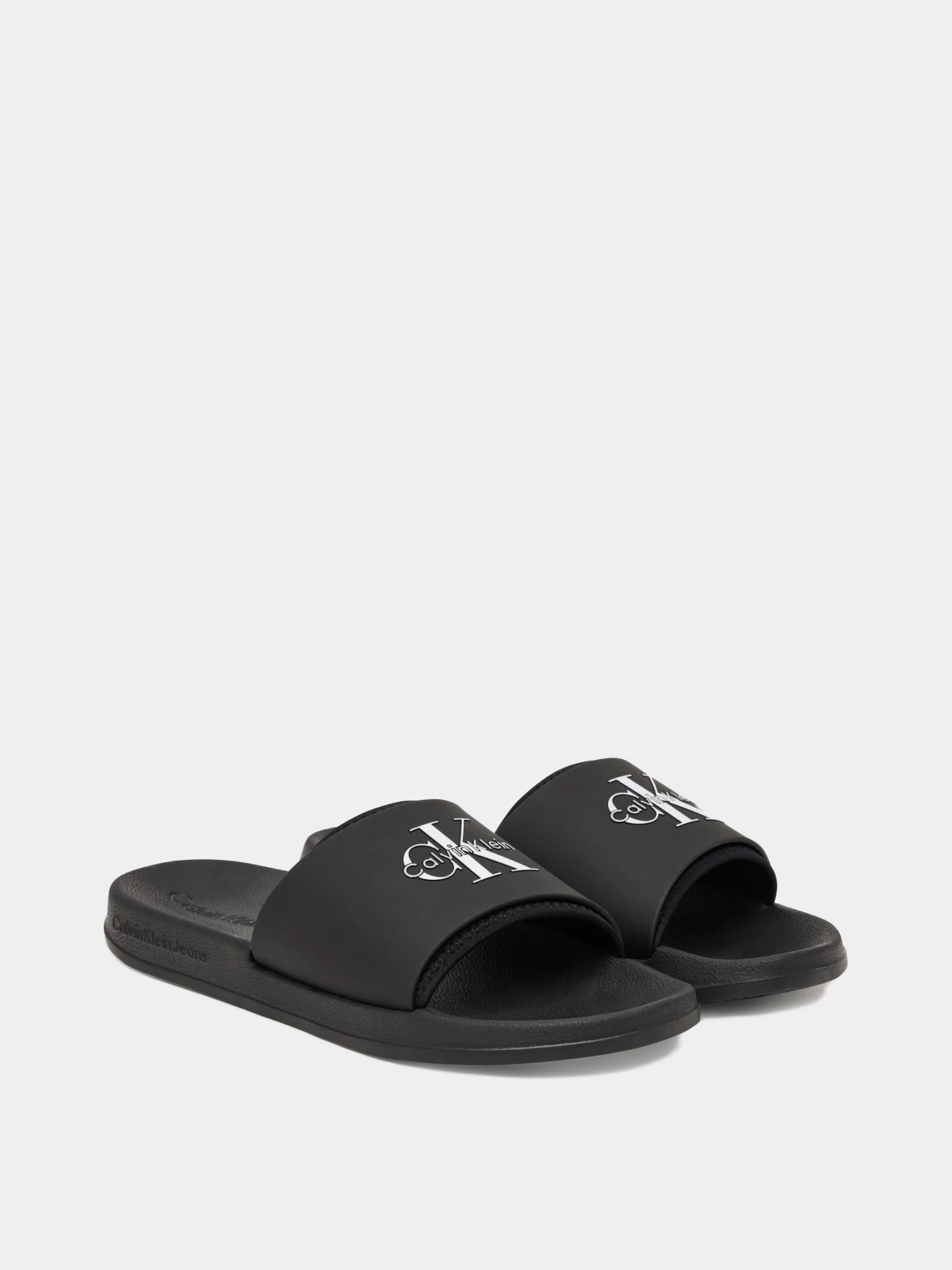 Шлёпанцы Calvin Klein модель HM0HM02229-0GJ Шлёпанцы Calvin Klein модель HM0HM02229-0GJ Фото