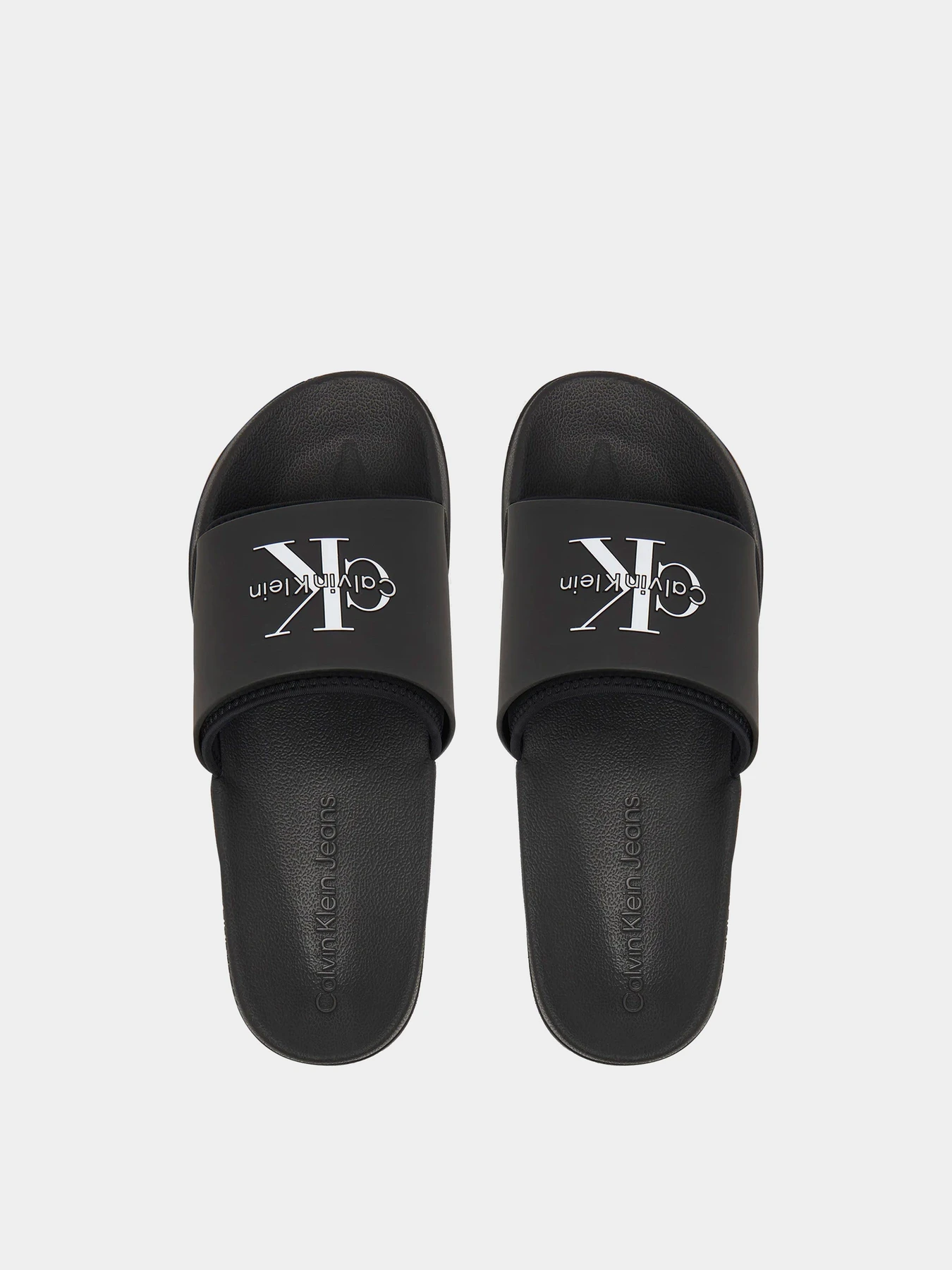 Шлёпанцы Calvin Klein модель HM0HM02229-0GJ Шлёпанцы Calvin Klein модель HM0HM02229-0GJ Фото