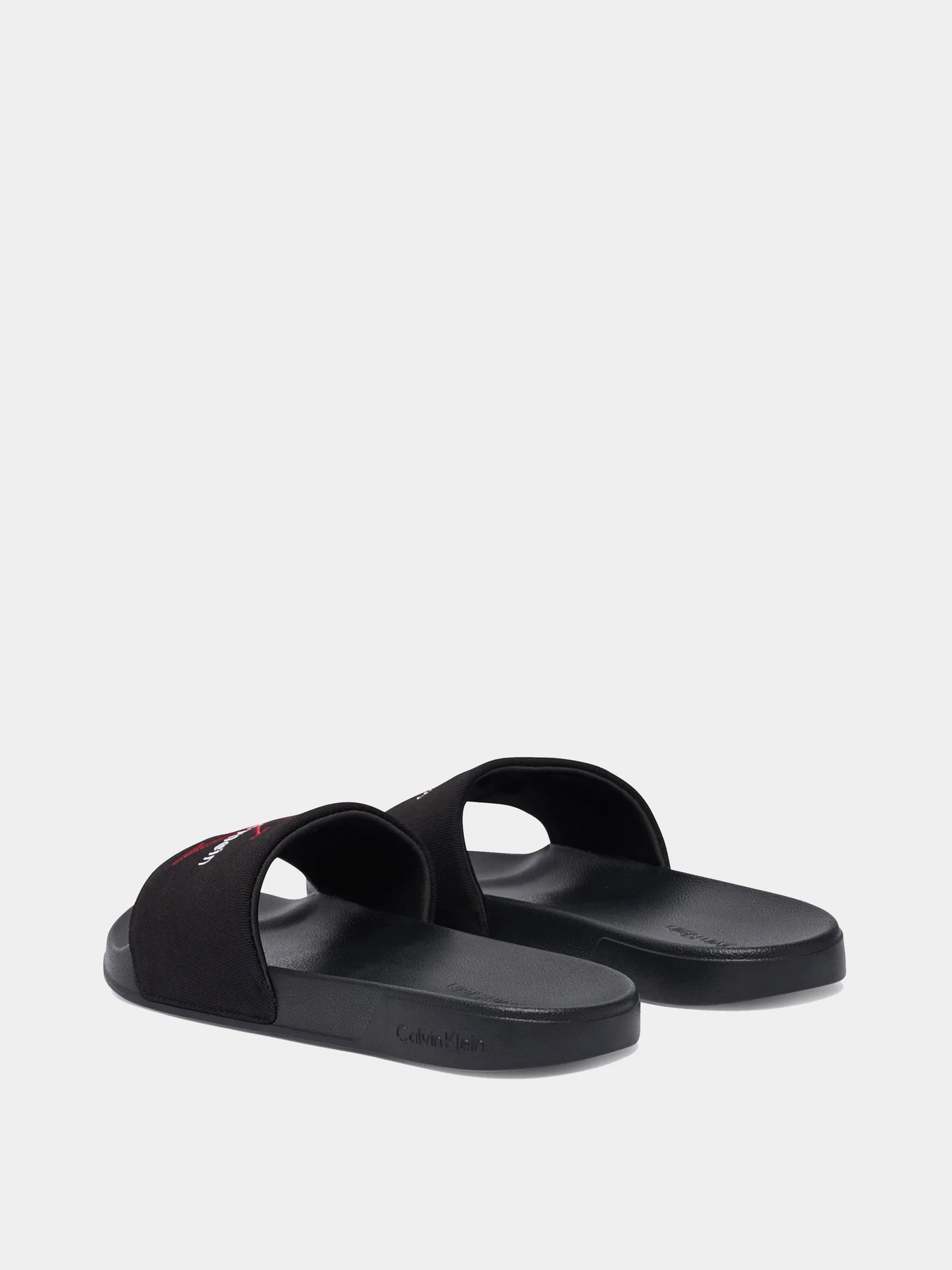Шлёпанцы Calvin Klein модель YM0YM01393-0KQ Шлёпанцы Calvin Klein модель YM0YM01393-0KQ Фото