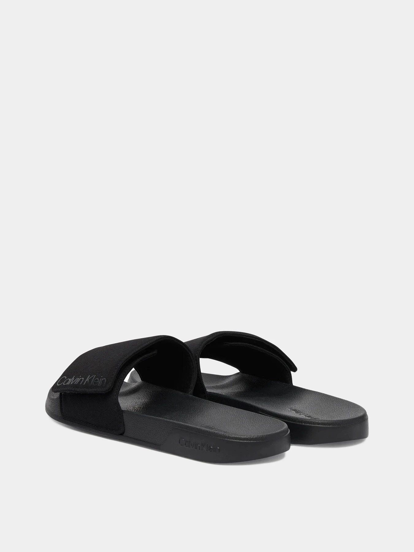 Шлёпанцы Calvin Klein модель HM0HM02115-0GJ Шлёпанцы Calvin Klein модель HM0HM02115-0GJ Фото